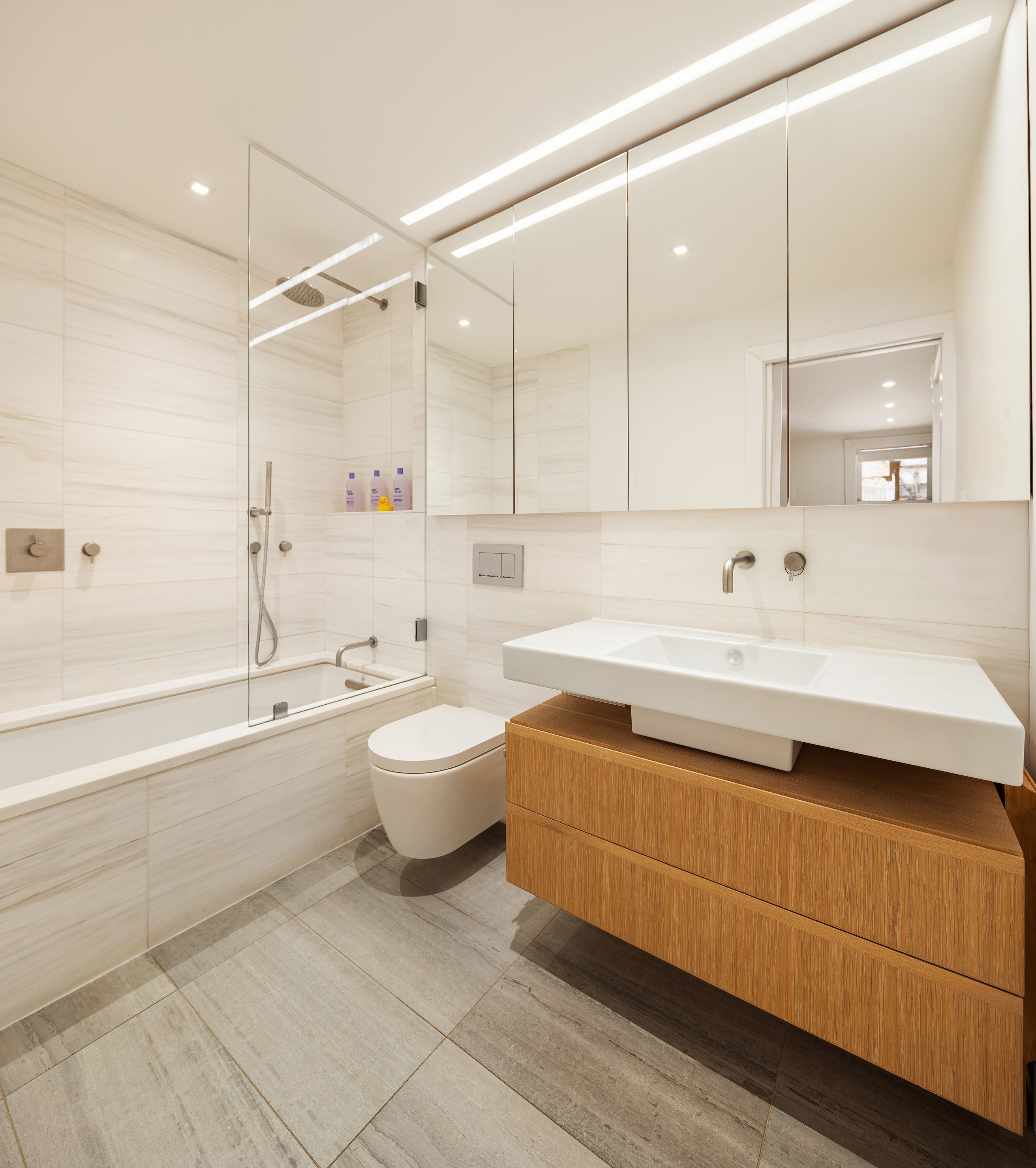 240 St Johns Place, Unit 1 Brooklyn, NY 11217 - Photo 9 of 13 a bathroom with a sink a toilet and bathtub