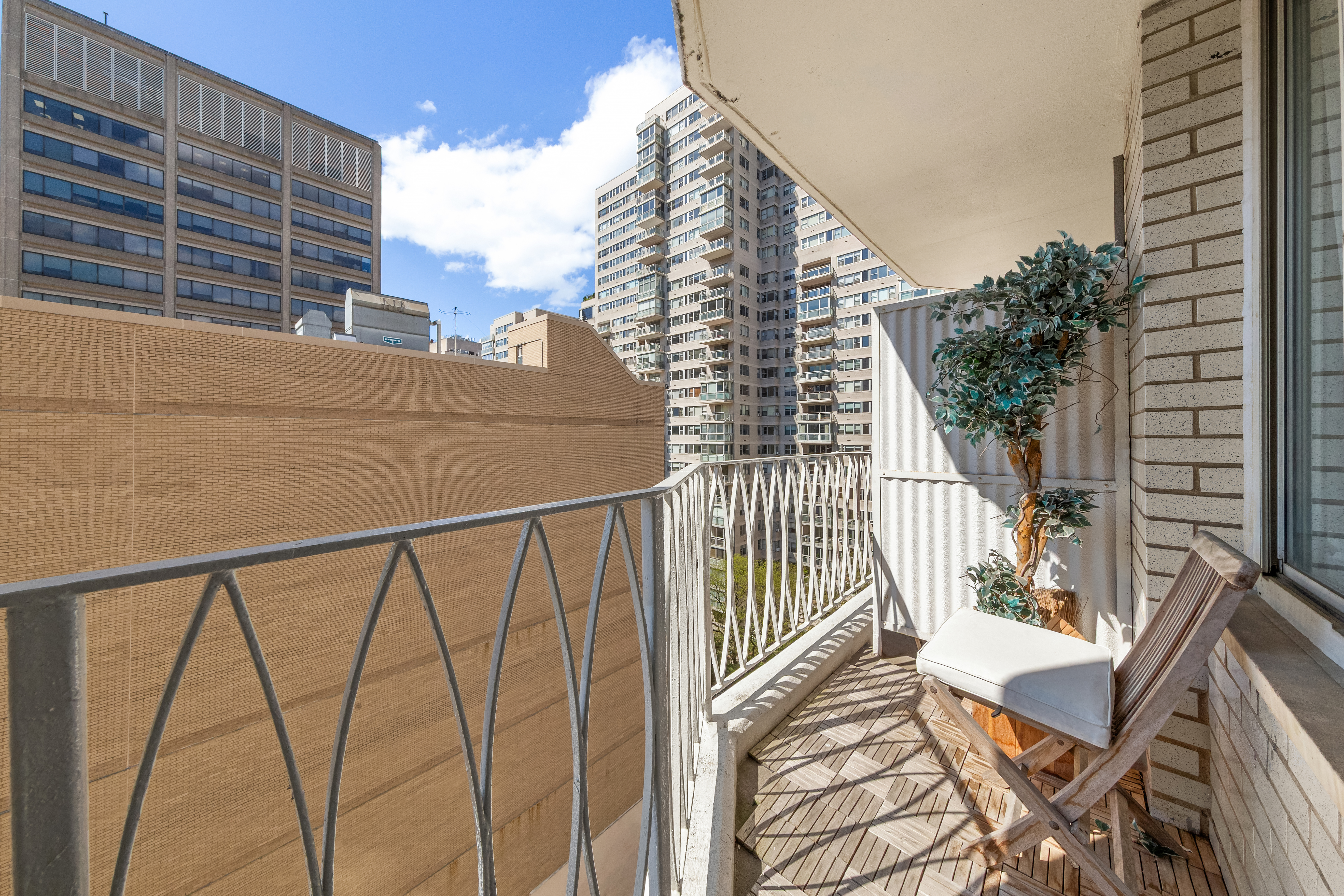 1160 3rd Avenue, Unit 12C Manhattan, NY 10065 - Photo 2 of 6 a view of balcony with furniture