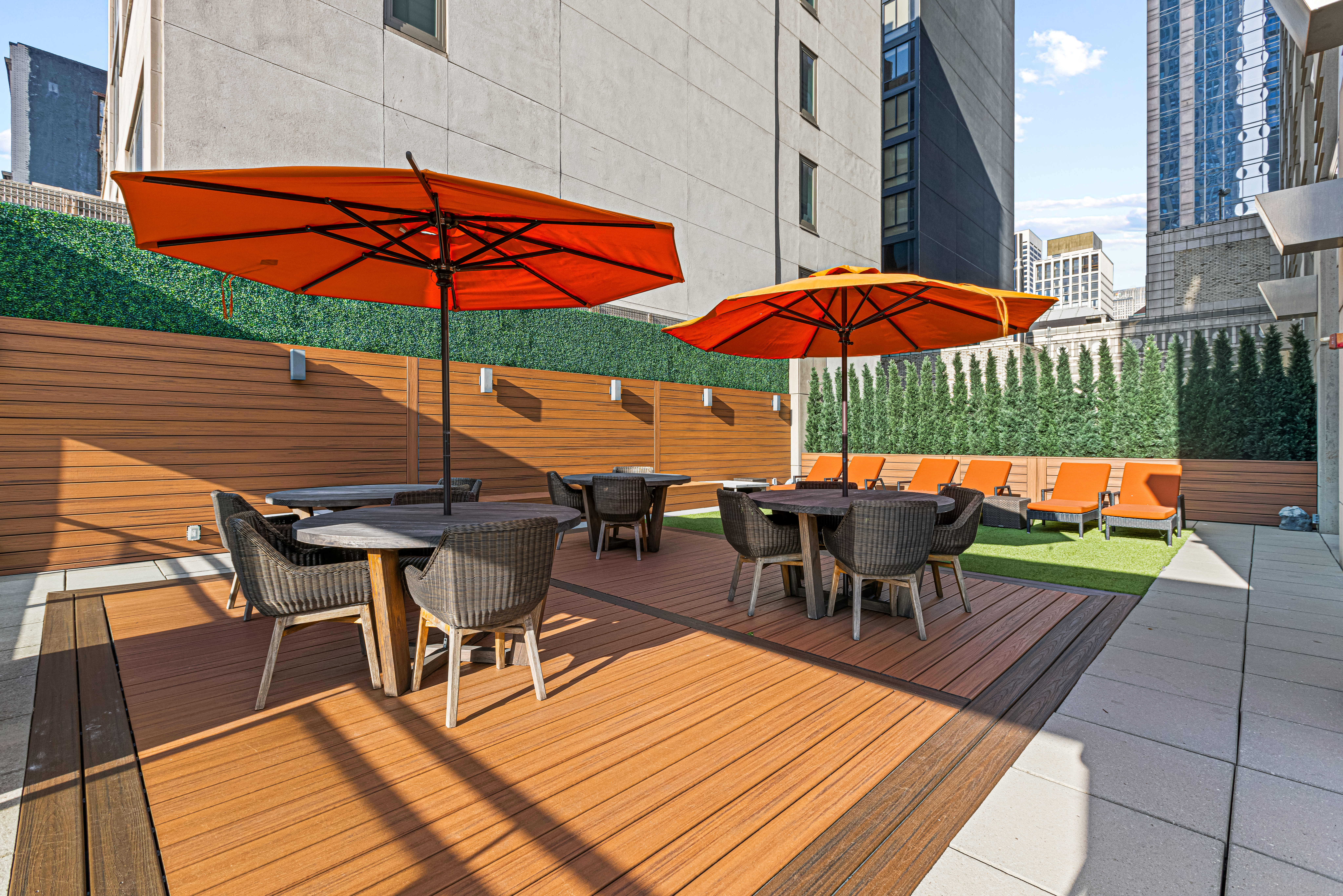 400 5th Avenue, Unit 49C Manhattan, NY 10018 - Photo 16 of 21 an outdoor space with furniture and umbrella