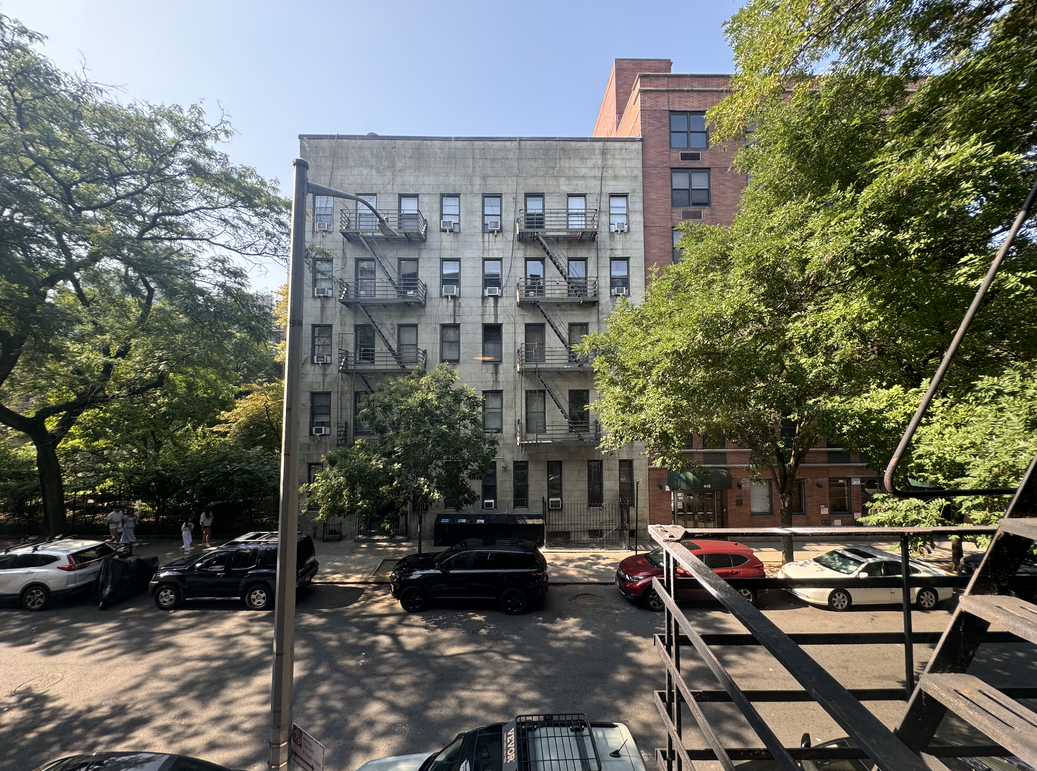 445 West 48th Street, Unit 2D Manhattan, NY 10036 - Photo 2 of 18 a view of a patio with table and chairs and potted plants