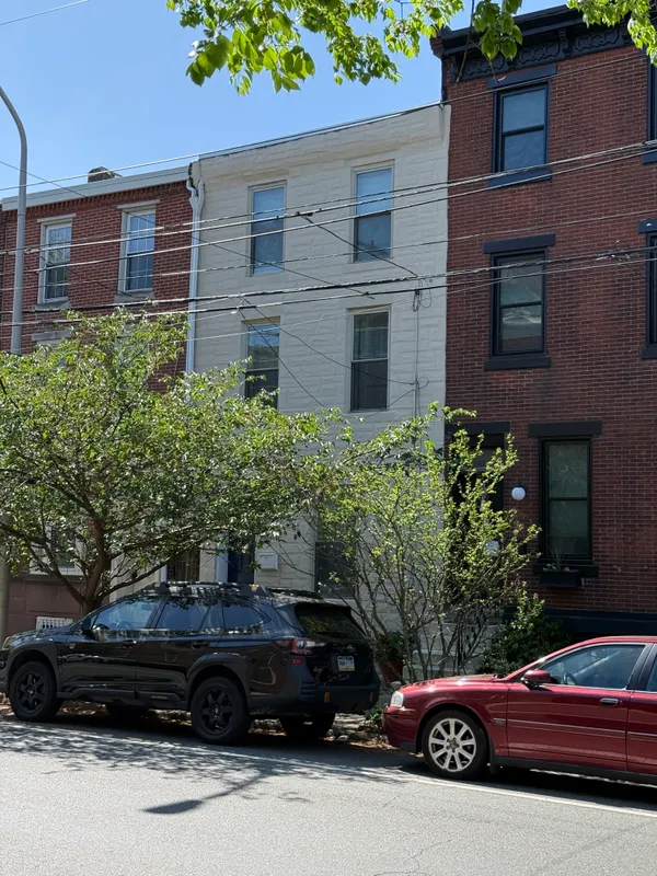 a car parked in front of a building