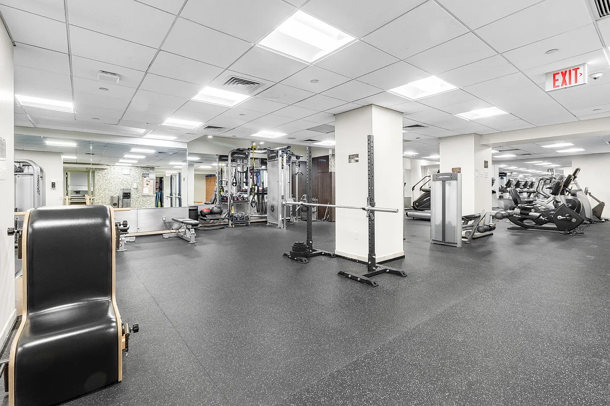 181 East 65th Street, Unit 5B Manhattan, NY 10065 - Photo 13 of 14 a view of a room with gym equipment