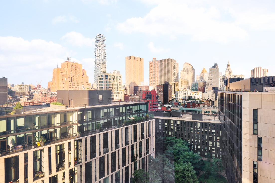 111 Murray Street, Unit 16B Manhattan, NY 10007 - Photo 21 of 22 a view of a city with tall buildings