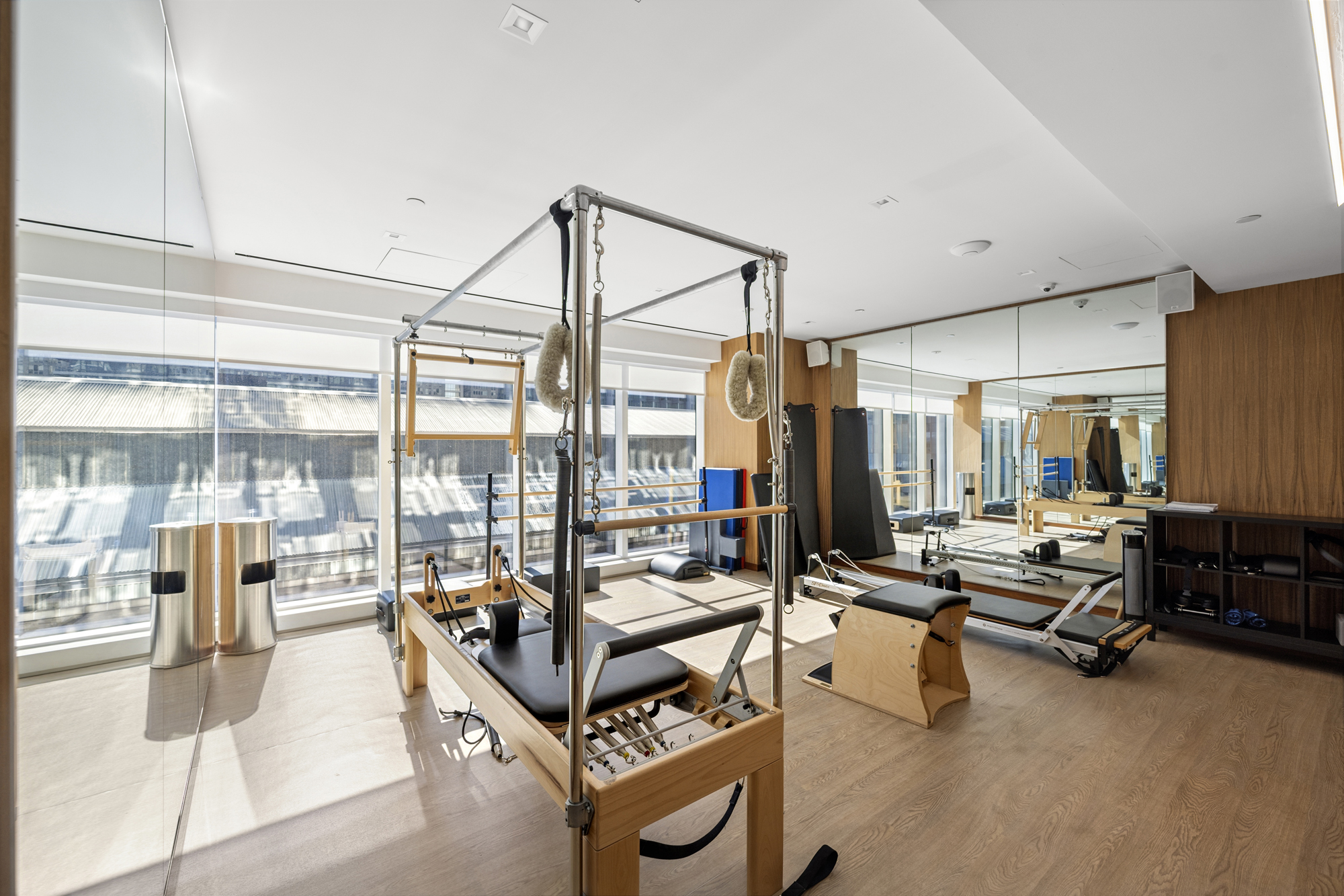 1 West End Avenue, Unit 26G Manhattan, NY 10023 - Photo 23 of 33 a living room with furniture gym equipment