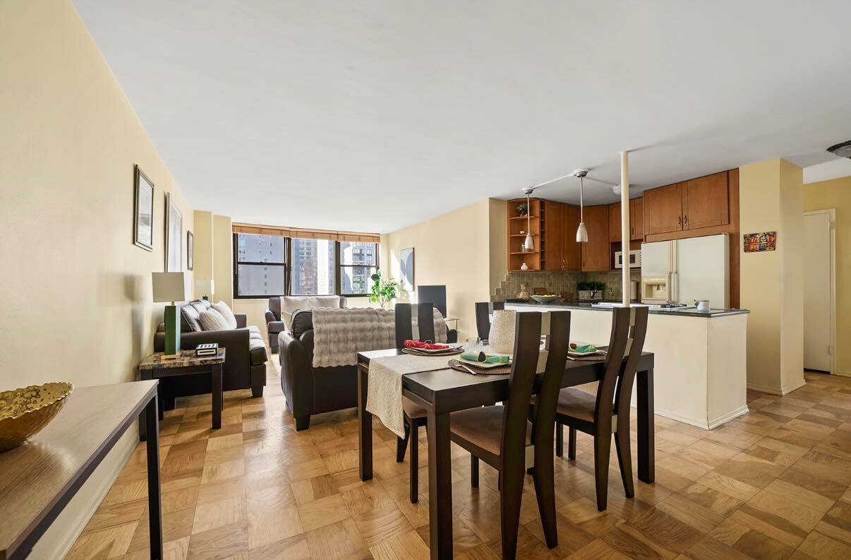 225 East 36th Street, Unit 10N Manhattan, NY 10016 - Photo 2 of 13 a view of a dining room with furniture