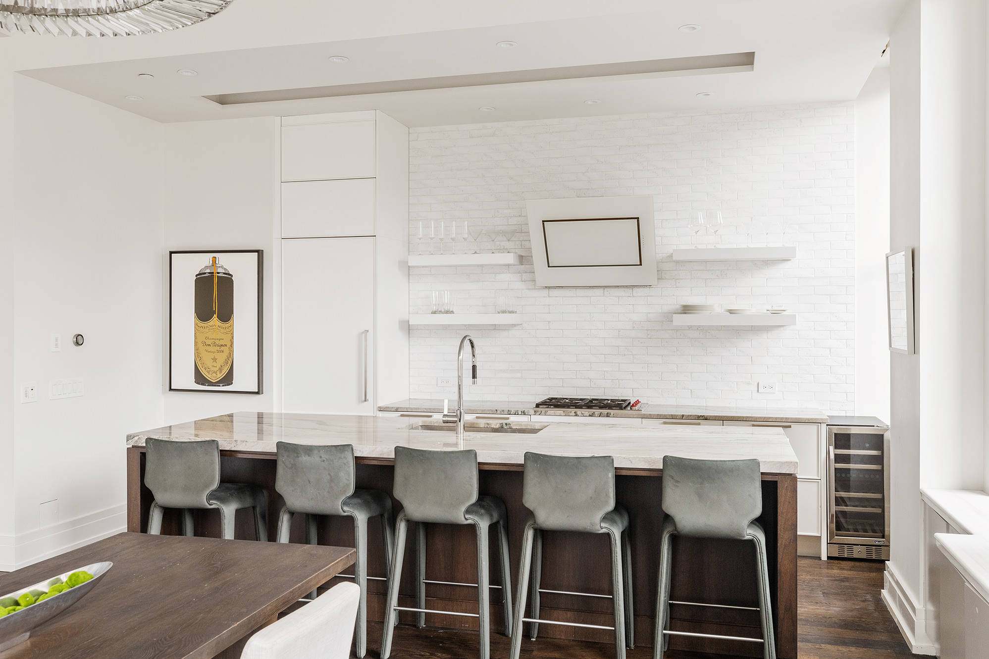260 Park Avenue South, Unit 6B Manhattan, NY 10010 - Photo 3 of 13 a dining room with furniture and wooden floor