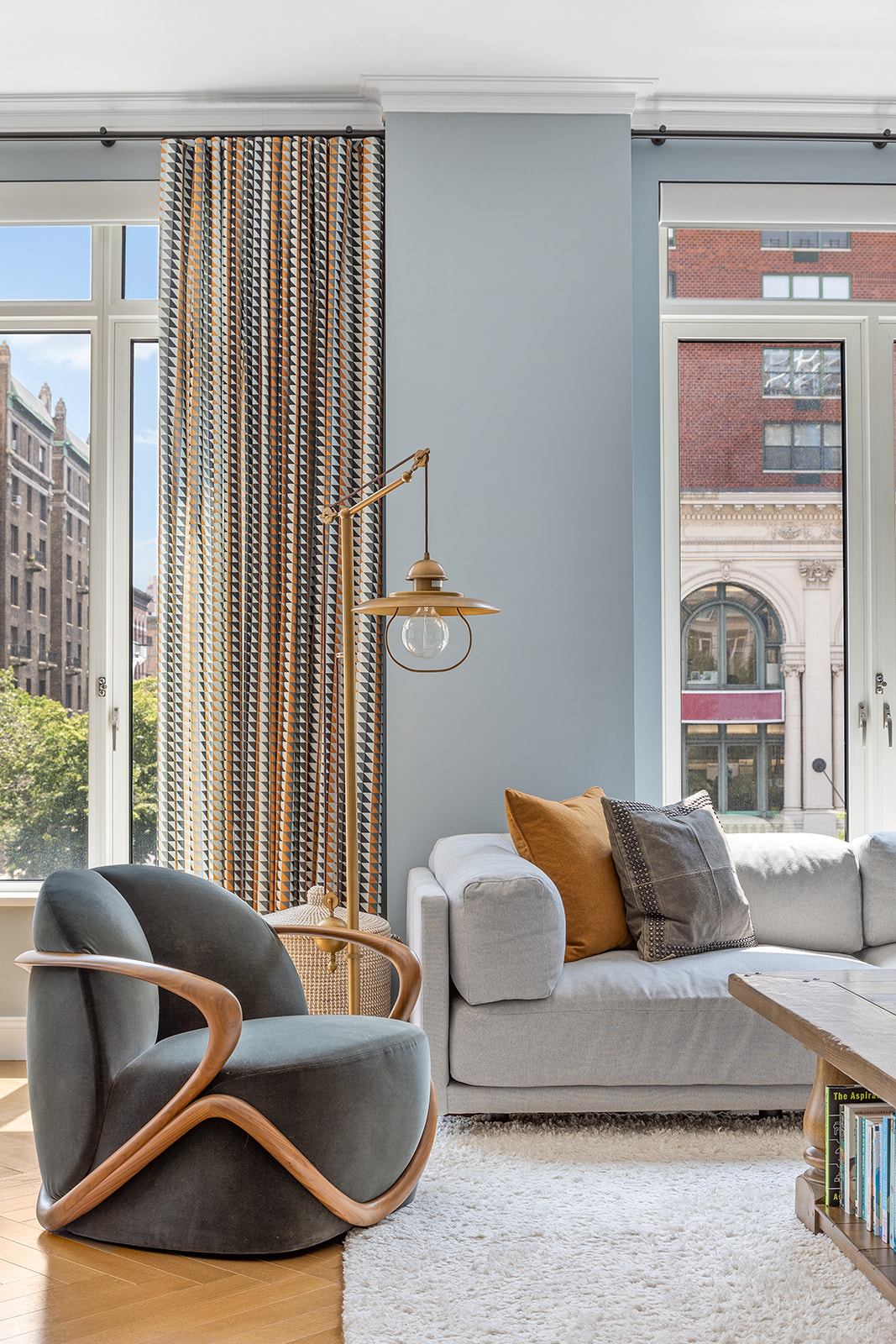 250 West 81st Street, Unit 4A Manhattan, NY 10024 - Photo 4 of 26 a living room with furniture and a large window