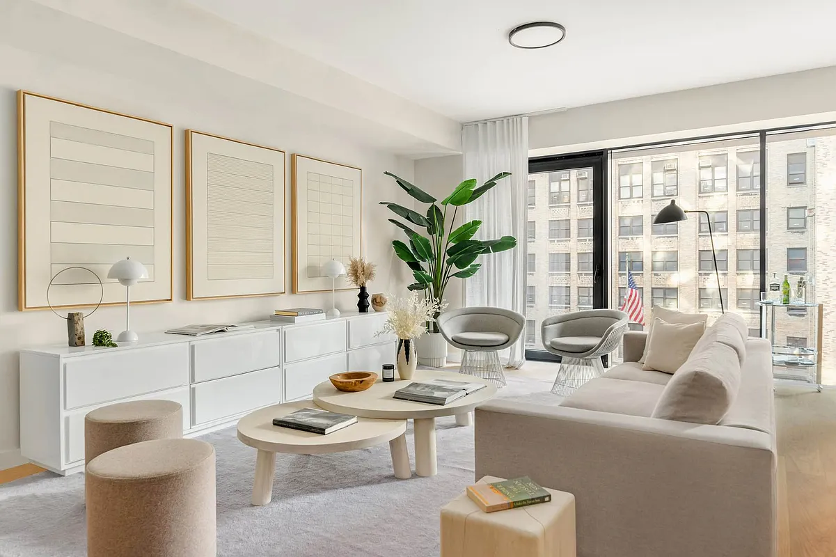 139 East 23rd Street, Unit 7 Manhattan, NY 10010 - Photo 2 of 17 a living room with furniture and a potted plant