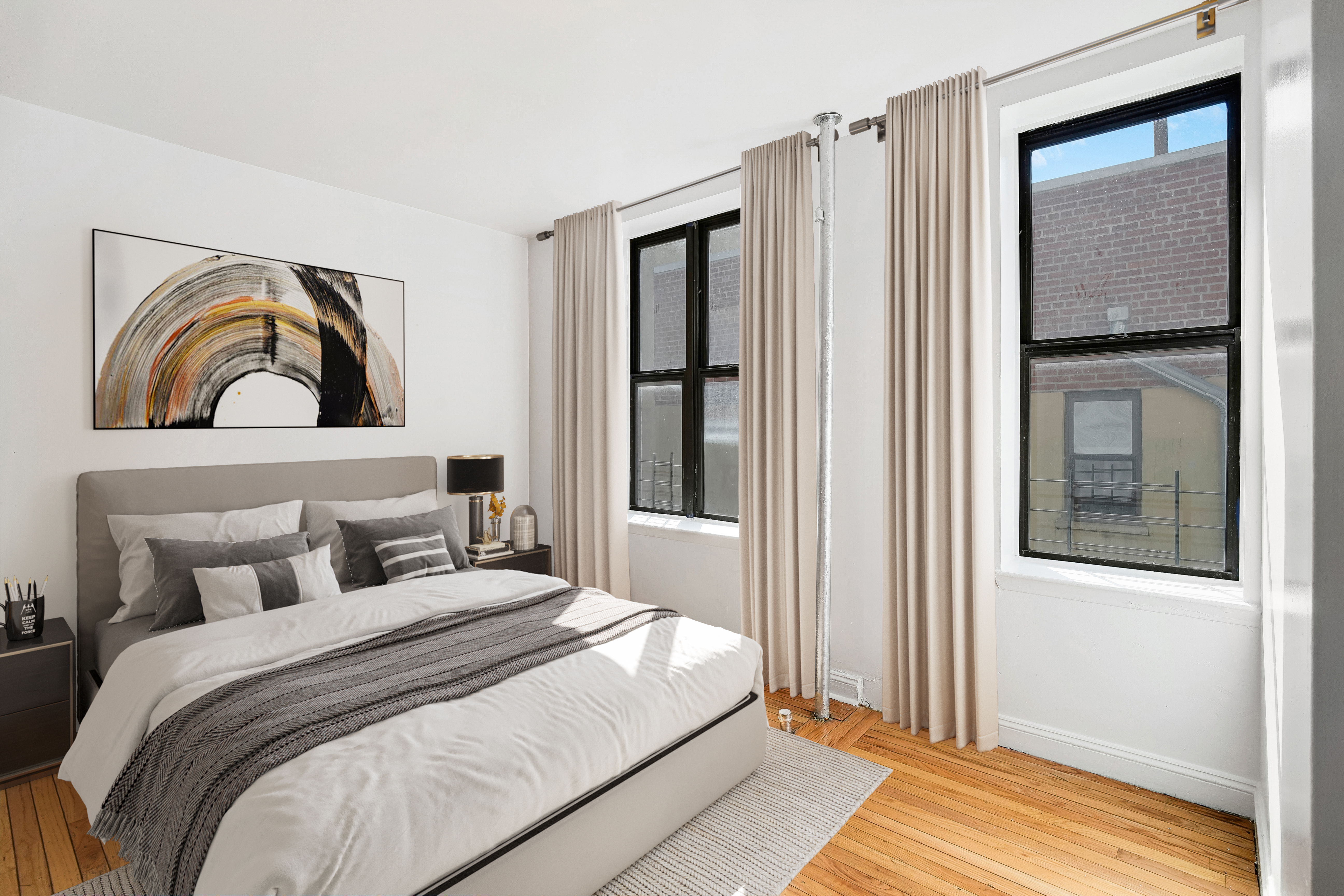 1809 Adam Clayton Powell Jr Boulevard, Unit 5F Manhattan, NY 10026 - Photo 6 of 11 a bedroom with a bed and a painting on the wall