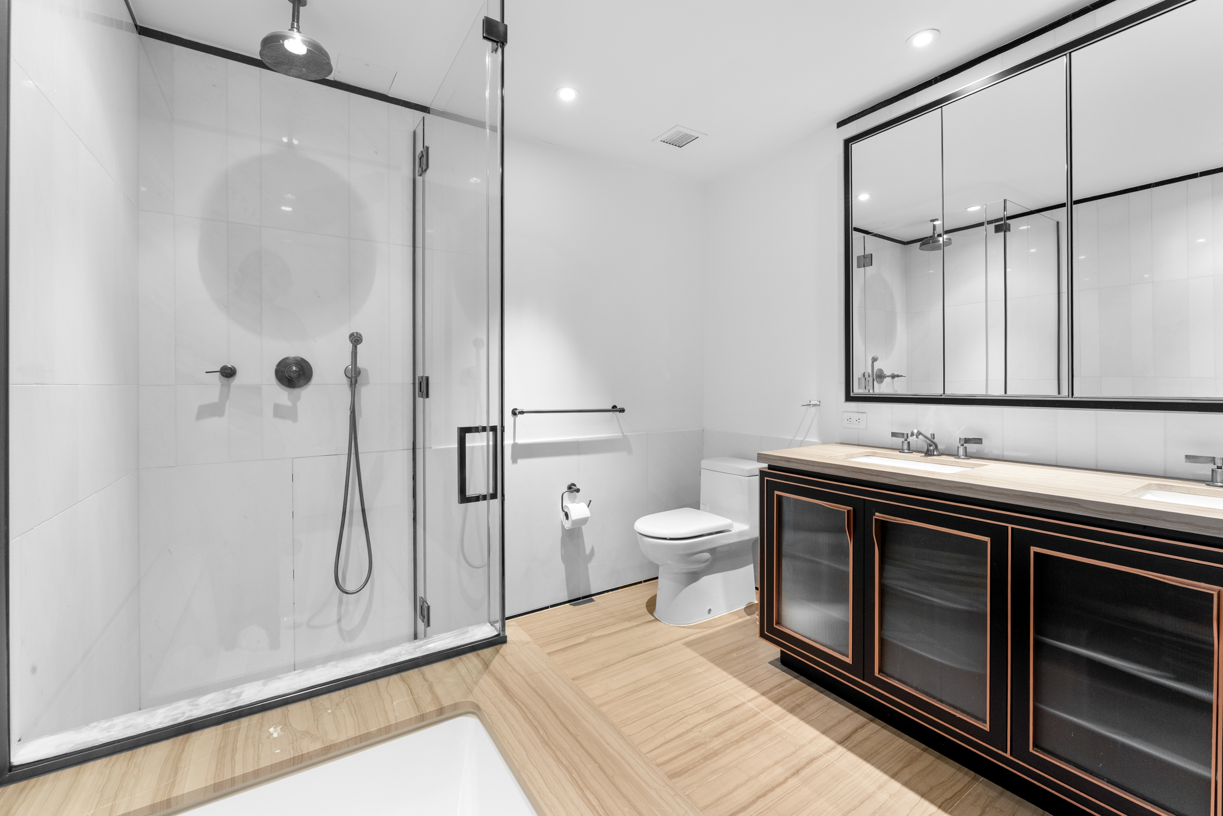 51 Jay Street, Unit 3I Brooklyn, NY 11201 - Photo 4 of 14 a bathroom with a sink a toilet and shower