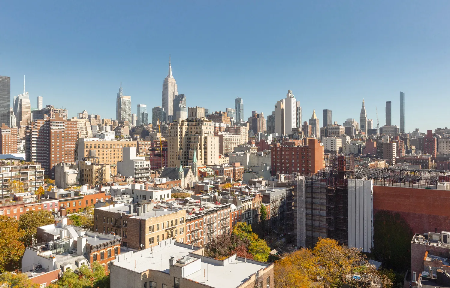 a view of a city with tall buildings
