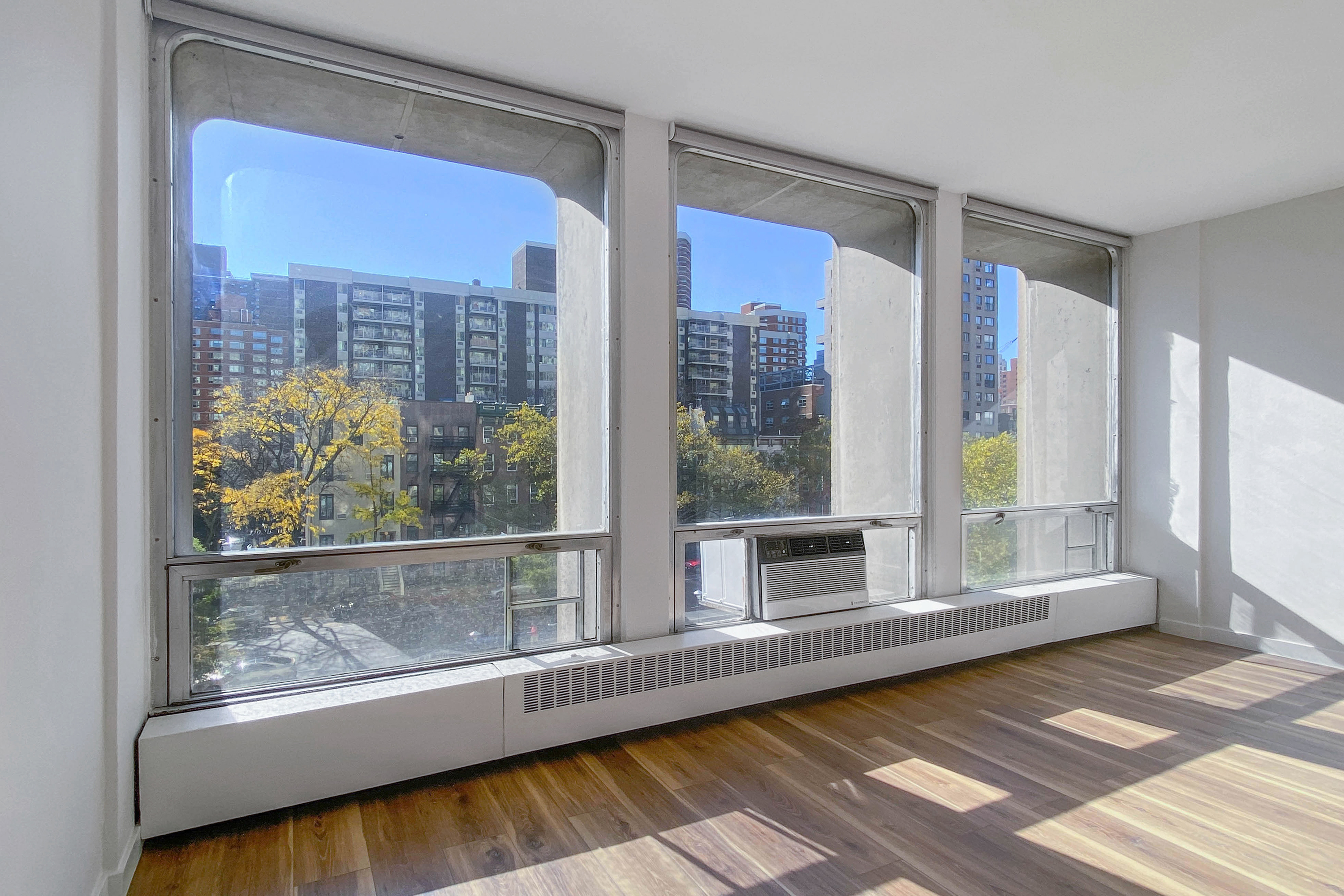 343 East 30th Street, Unit 4F Manhattan, NY 10016 - Photo 2 of 16 a view of a living room with a large window