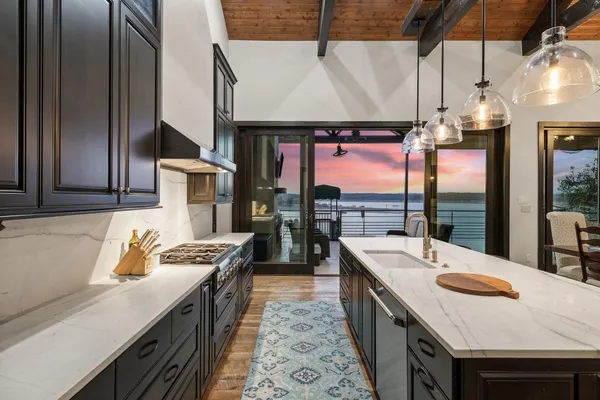a kitchen that has a lot of cabinets