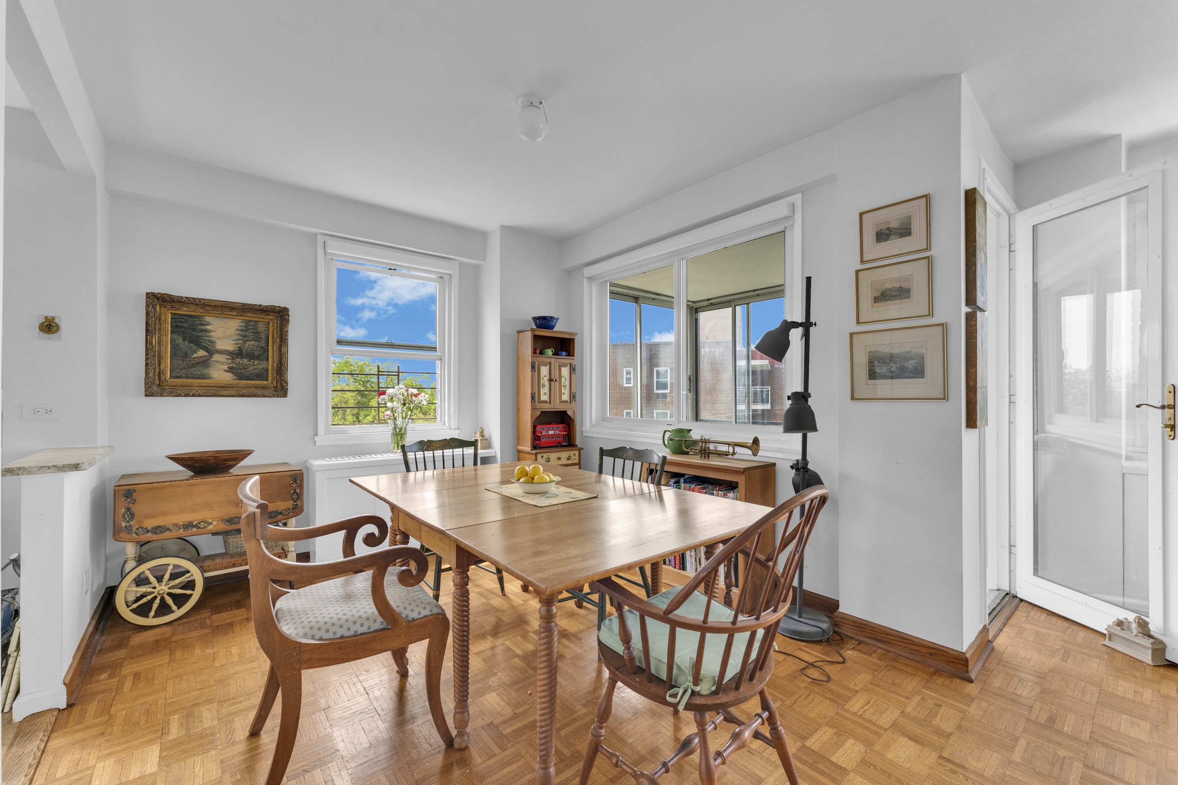2621 Palisade Avenue, Unit 11J Bronx, NY 10463 - Photo 9 of 19 a dining room with furniture and window