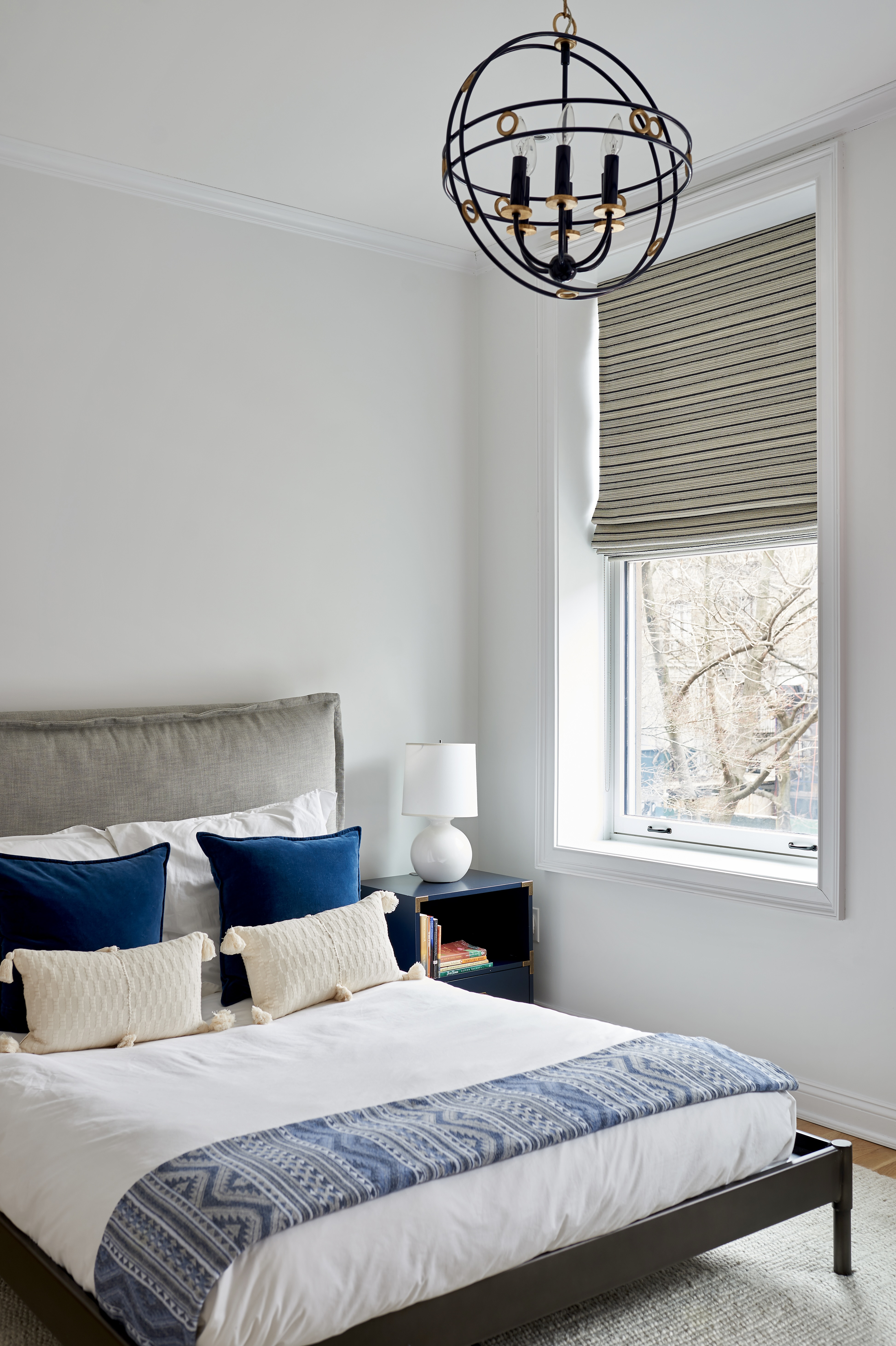 435 Clinton Avenue Brooklyn, NY 11238 - Photo 17 of 27 a bedroom with a bed and a window