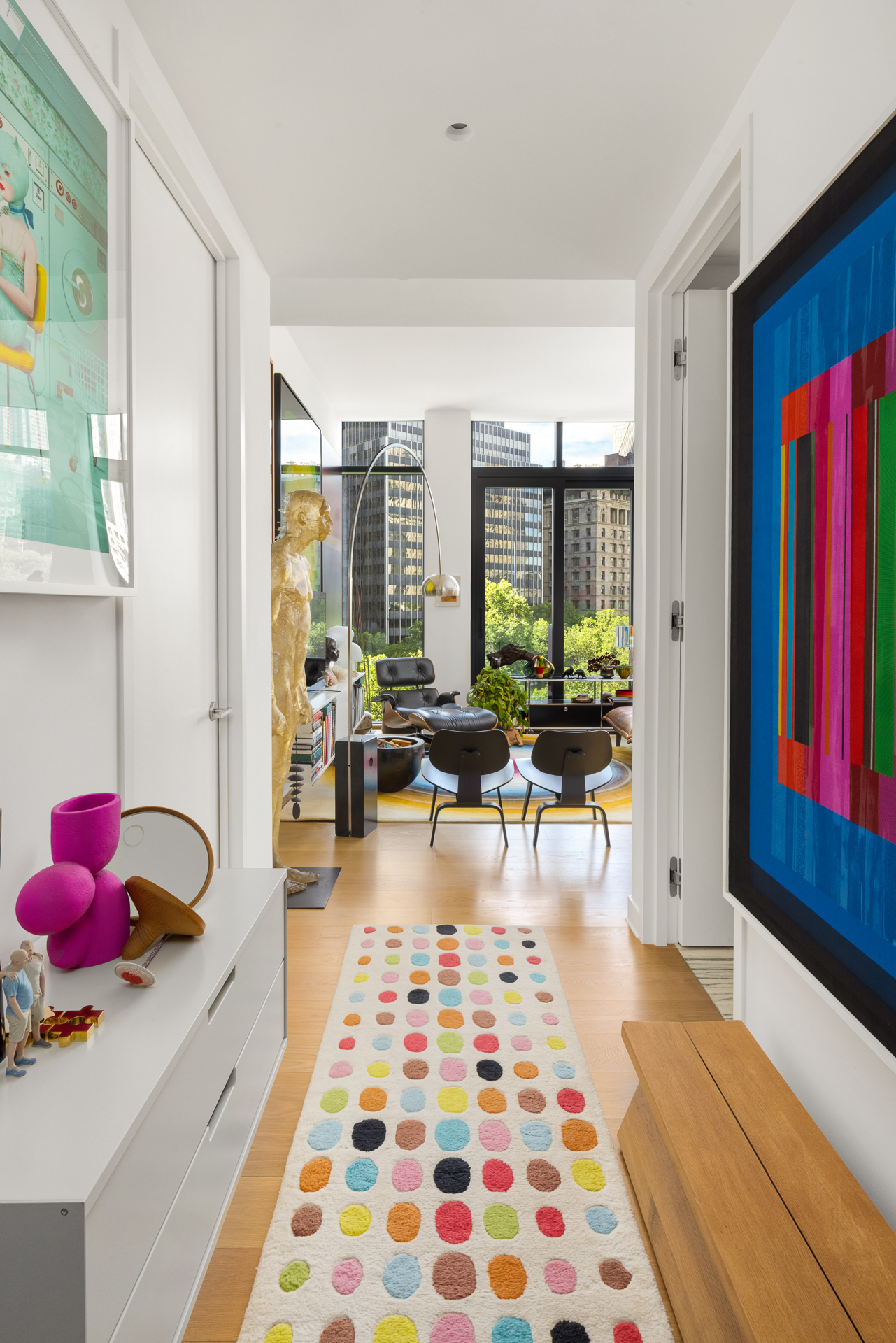 33 Park Row, Unit 6B Manhattan, NY 10038 - Photo 12 of 20 a bedroom with furniture and a window
