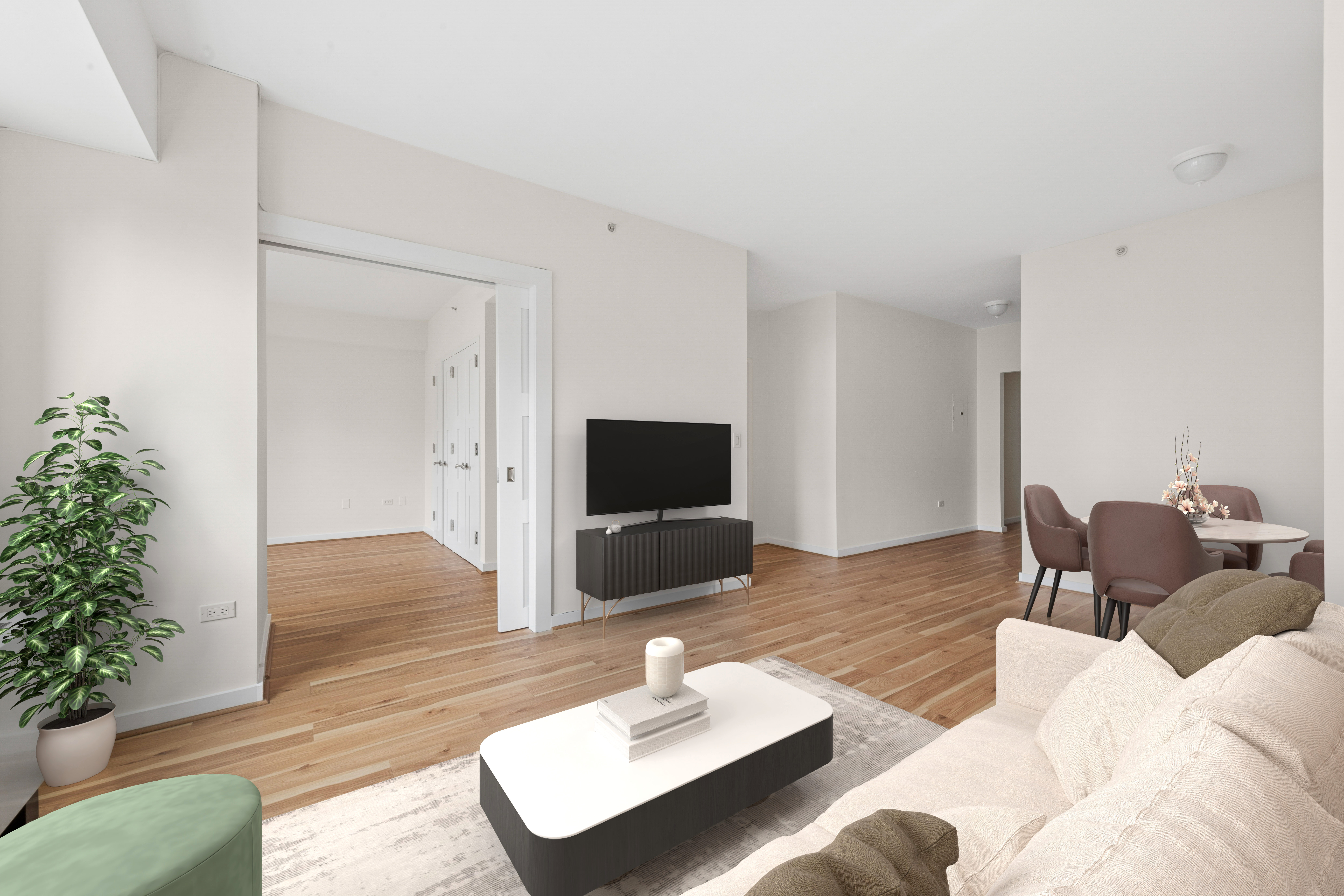 425 5th Avenue, Unit 23D Manhattan, NY 10016 - Photo 5 of 20 a living room with furniture and a flat screen tv