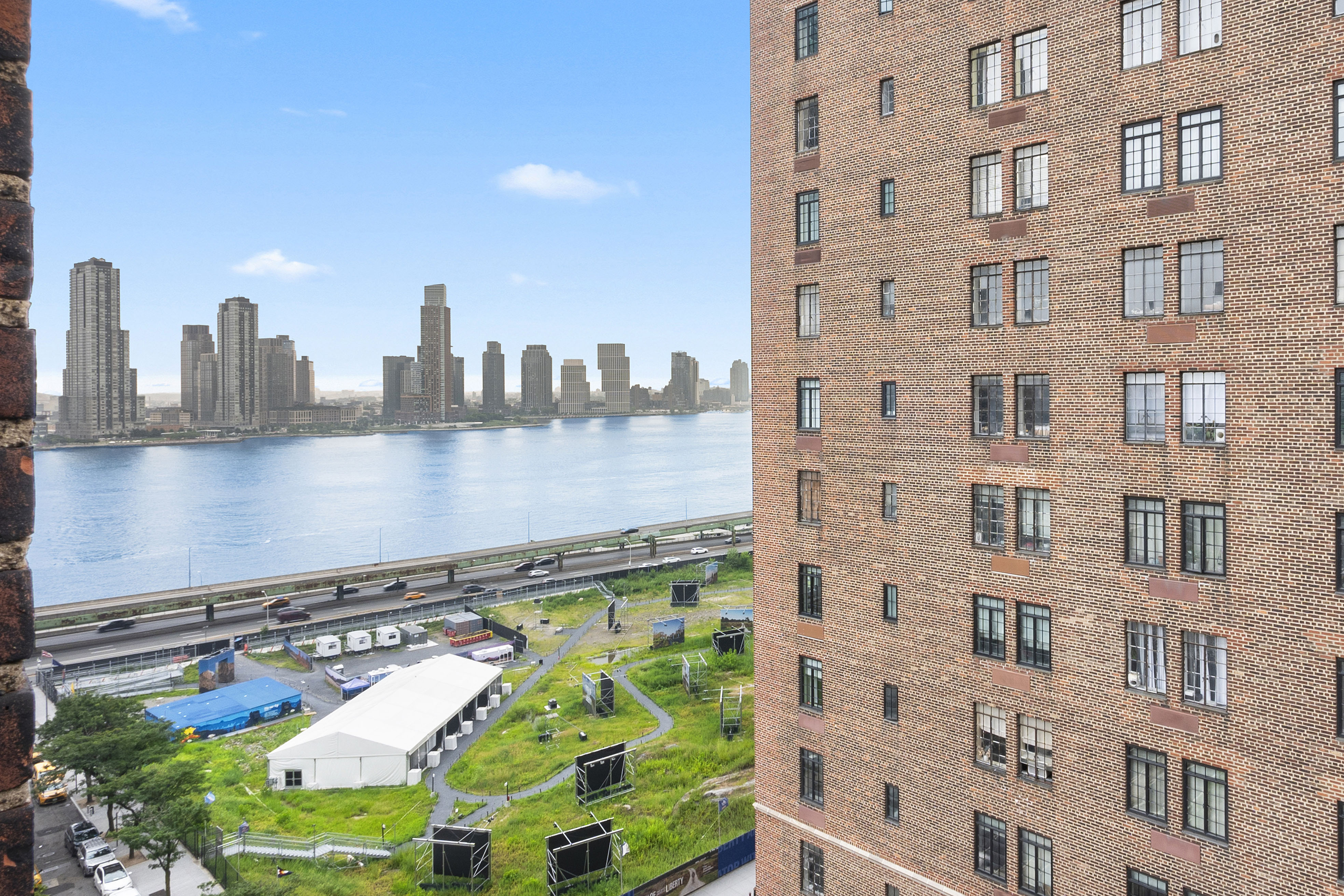 25 Tudor City Place, Unit 922 Manhattan, NY 10017 - Photo 4 of 9 a view of a city with tall buildings