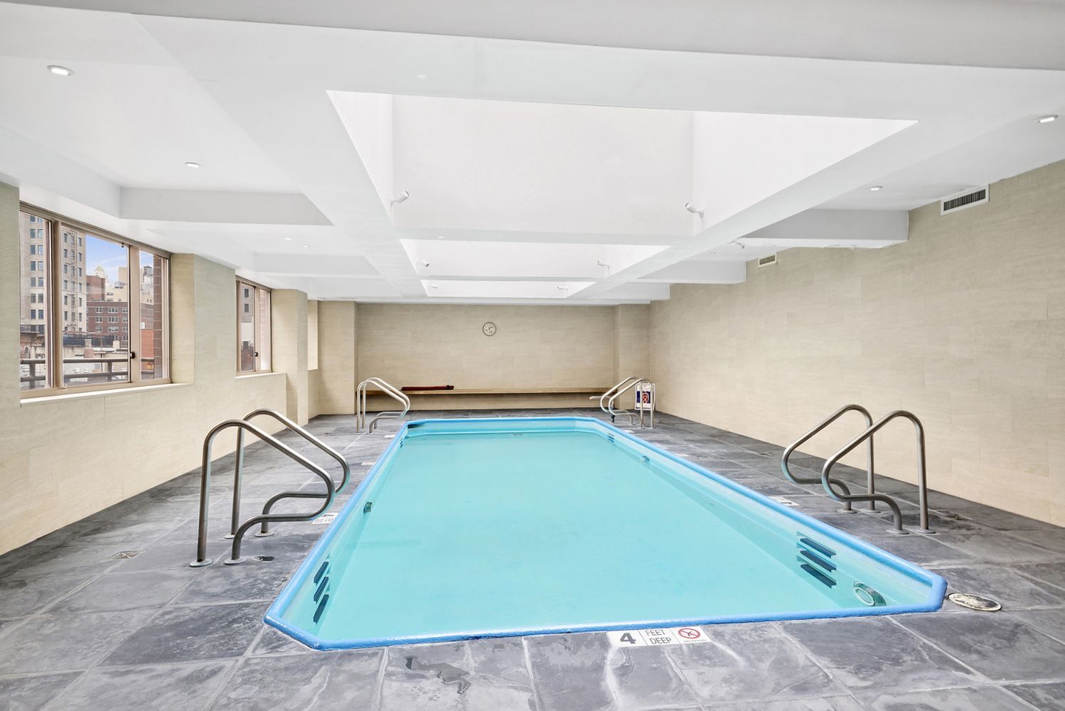 350 East 82nd Street, Unit 4C Manhattan, NY 10028 - Photo 11 of 13 a room with gym equipment