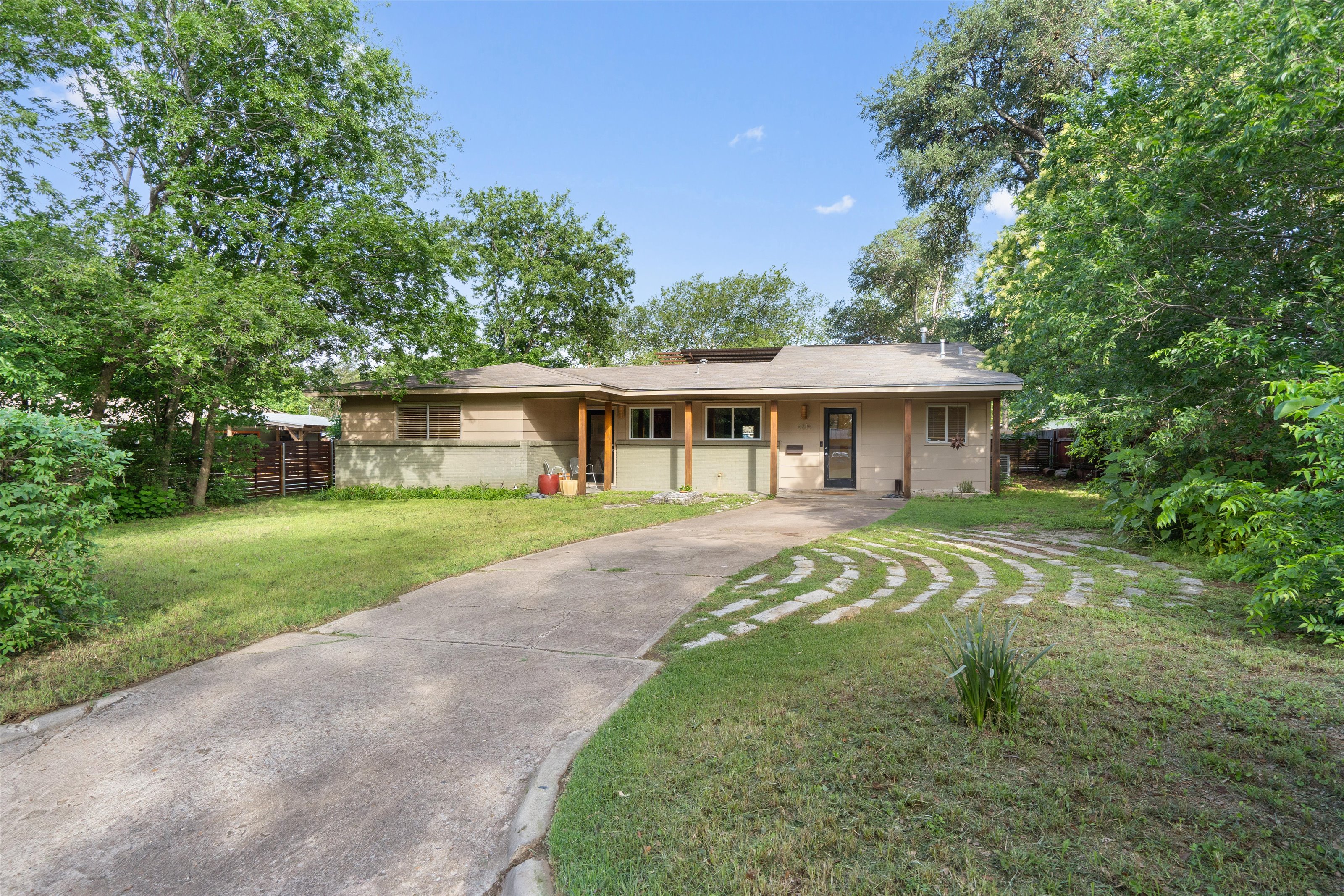 4614 Jinx Avenue Austin, TX 78745 - Photo 40 of 40 a view of a house with a yard