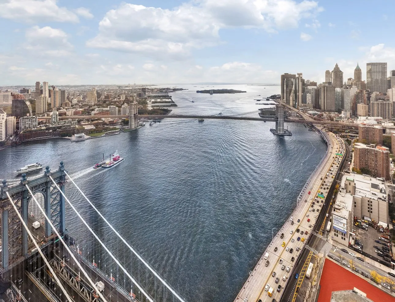 a view of a terrace with lawn chairs