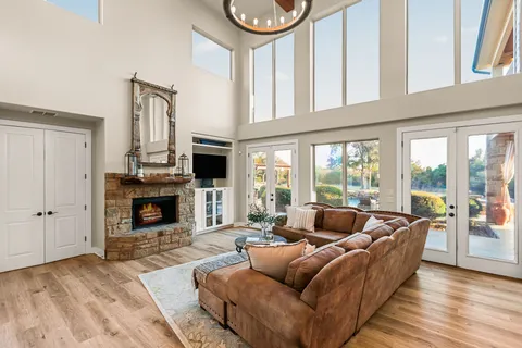 a bedroom with a bed and a lamp on table