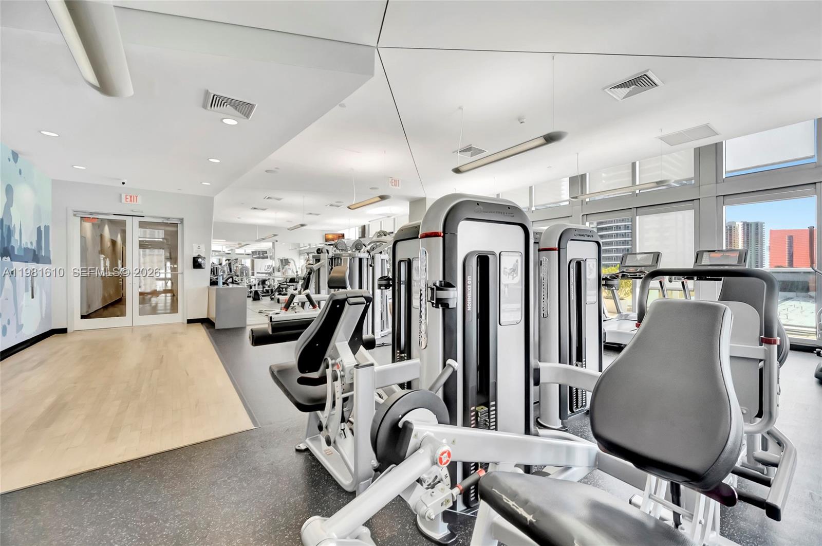 79 Southwest 12th Street, Unit 2201S Miami, FL 33130 - Photo 27 of 33 a view of a room with gym equipment