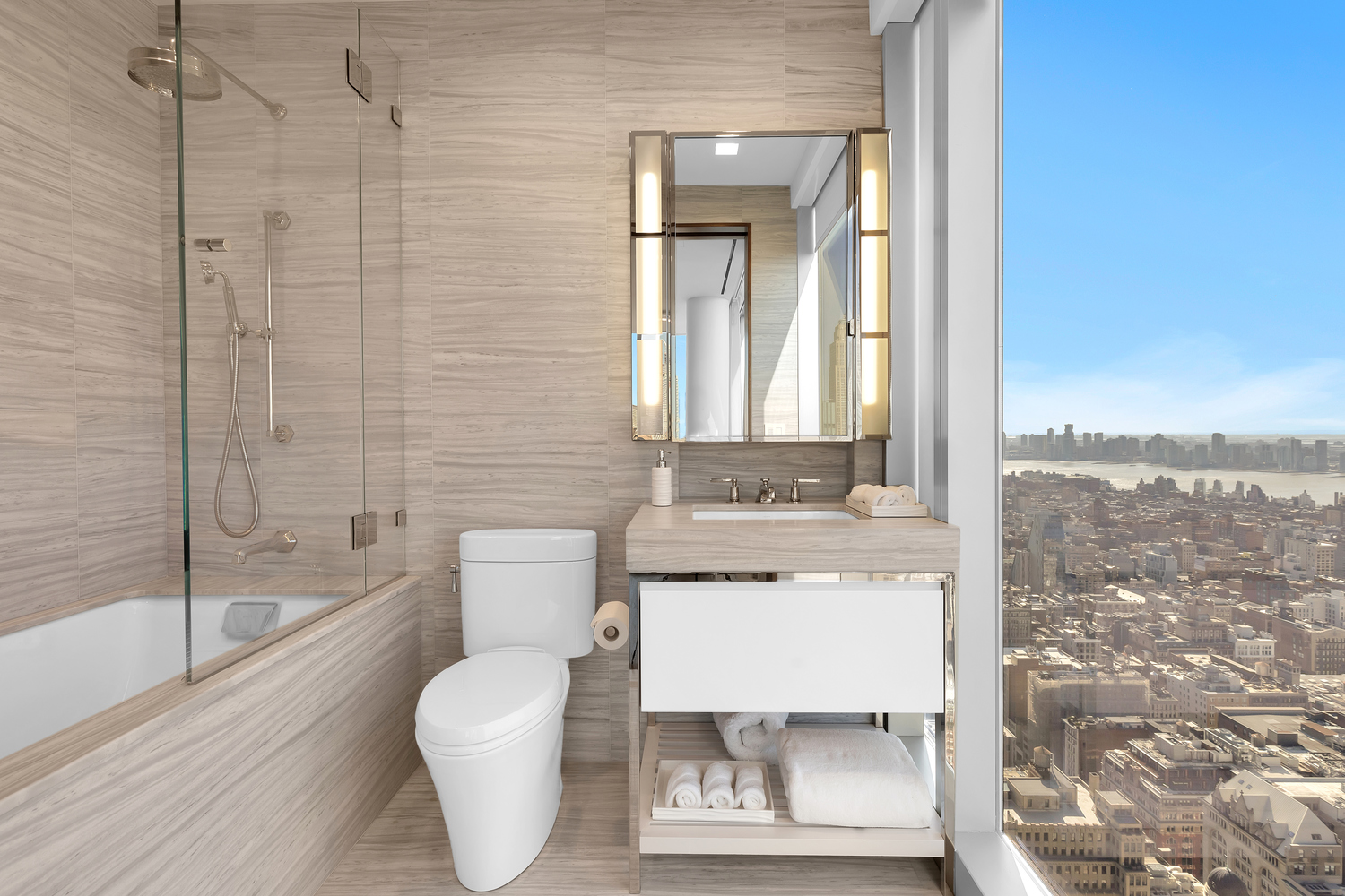 23 East 22nd Street, Unit PH Manhattan, NY 10010 - Photo 13 of 32 a bathroom with a toilet sink and bathtub