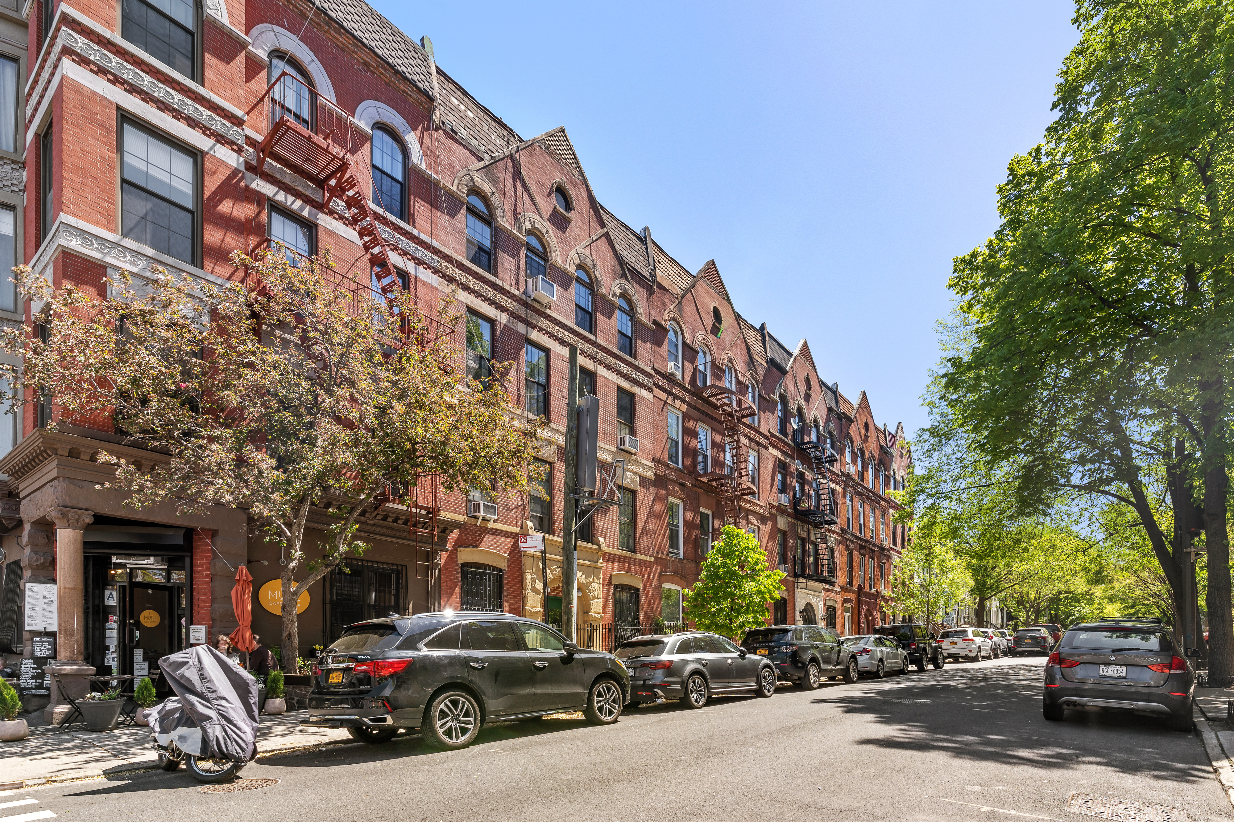 353 12th Street, Unit 2 Brooklyn, NY 11215 - Photo 15 of 17 a car parked in front of a building