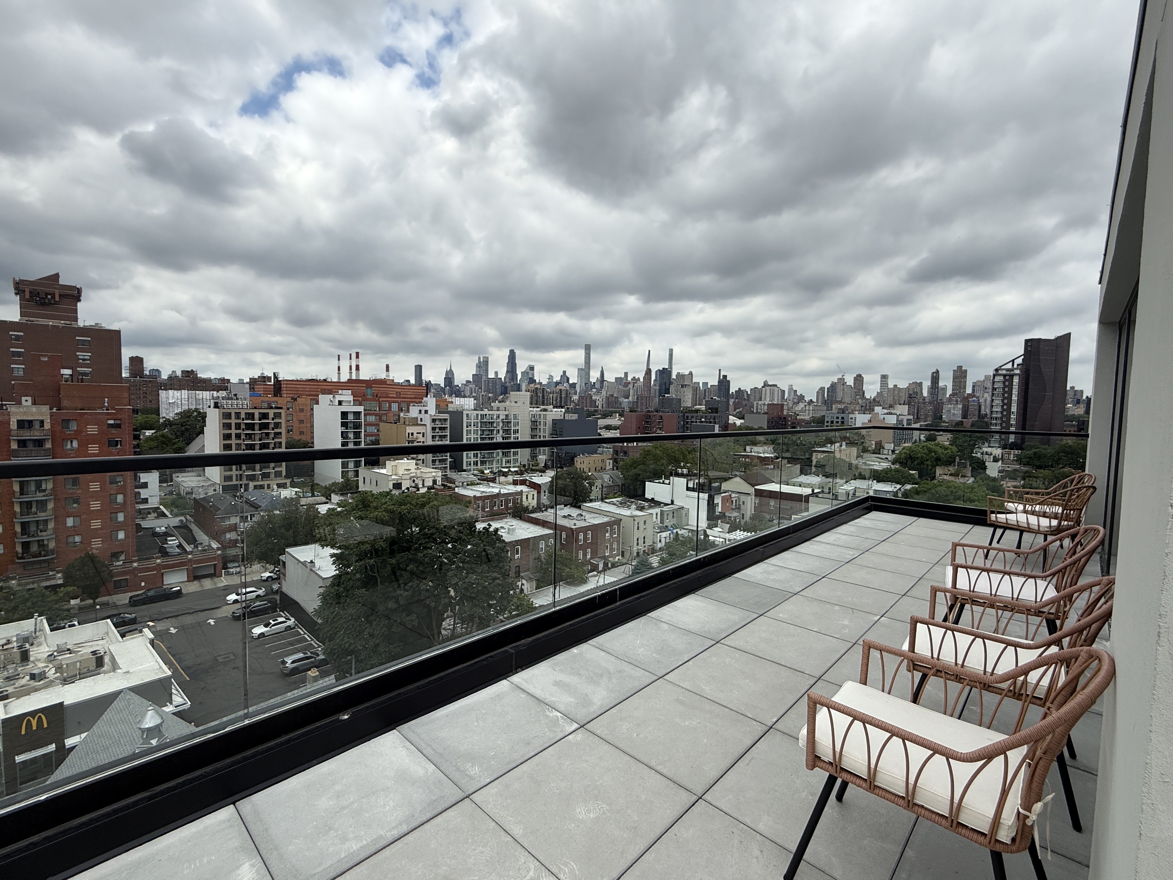 31-16 21st Street, Unit 3E Queens, NY 11106 - Photo 11 of 17 a view of swimming pool from a terrace