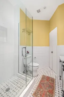 a bathroom with a sink and a toilet