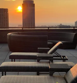 a roof deck with furniture