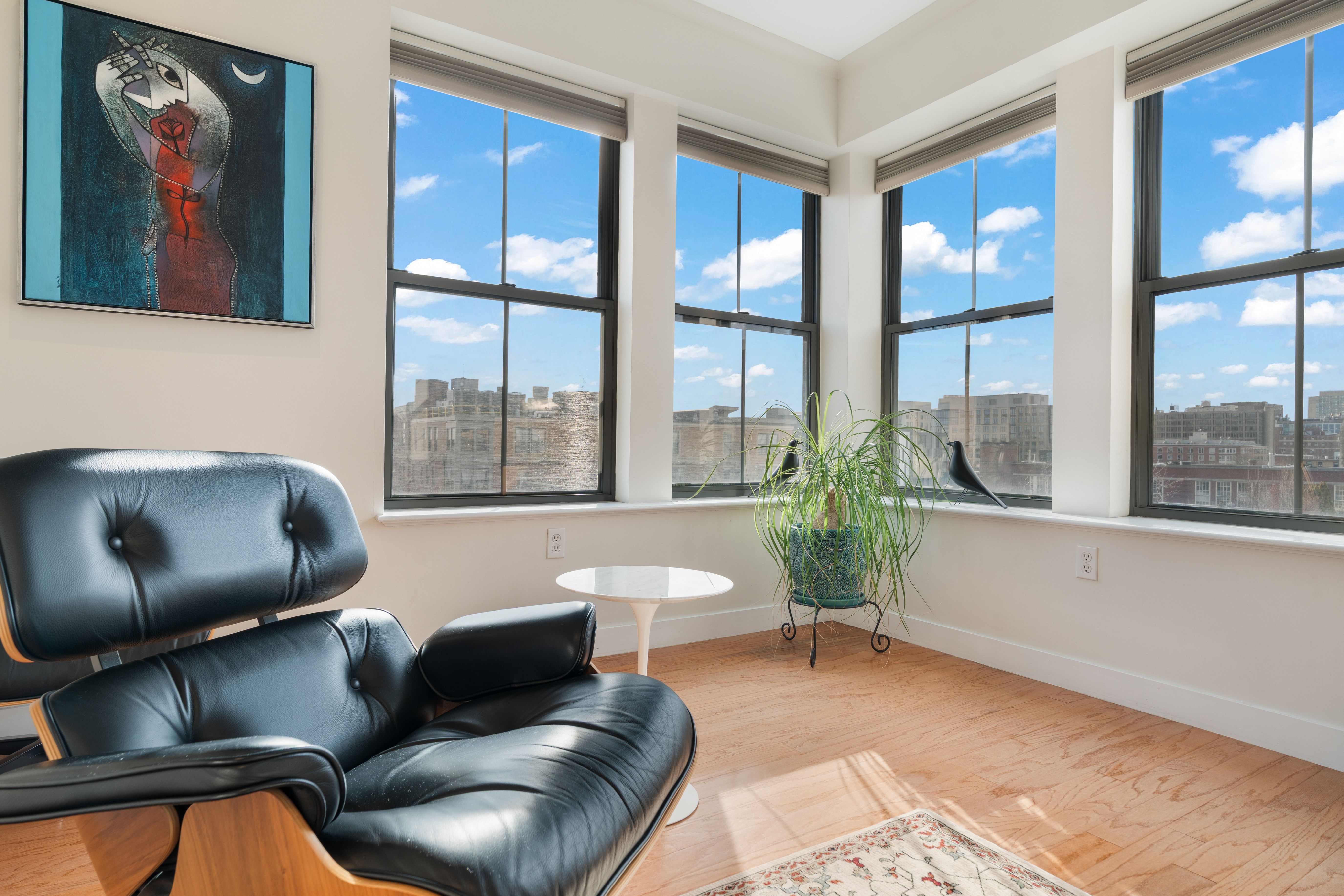 2 Rollins Street, Unit D601 Boston, MA 02118 - Photo 6 of 29 a living room with furniture and a large window