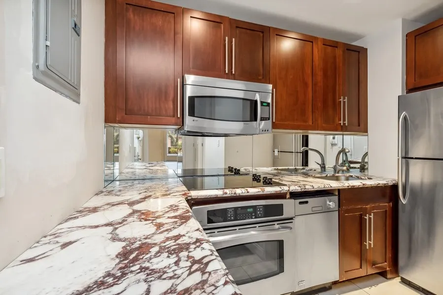 a kitchen with a stove and a microwave