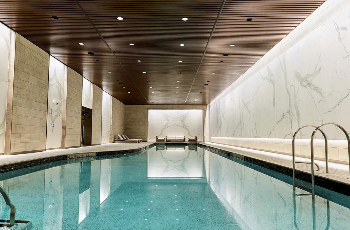 252 East 57th Street, Unit 60A Manhattan, NY 10022 - Photo 22 of 28 a view of swimming pool with a balcony