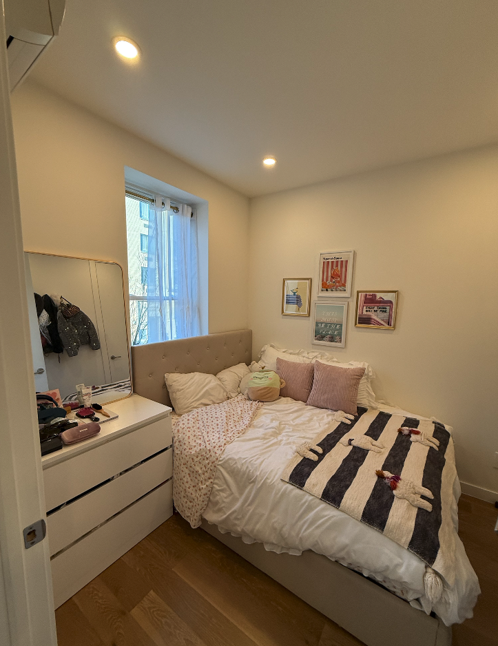 34 Carmine Street, Unit 2D Manhattan, NY 10014 - Photo 5 of 8 a bedroom with a bed and a window