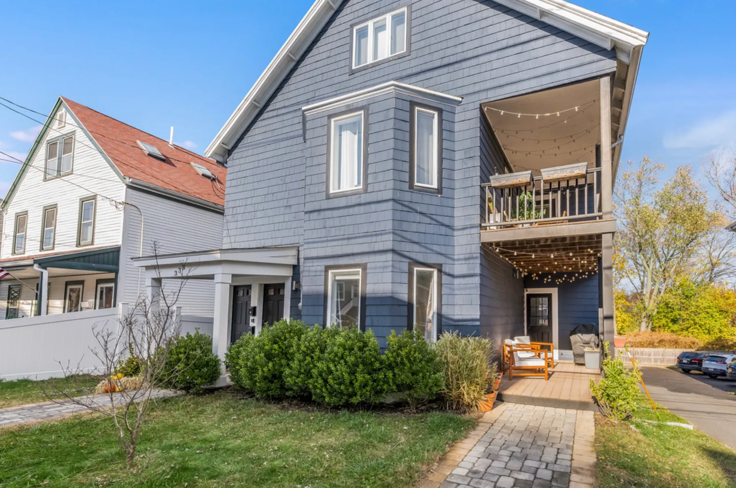 a front view of a house with garden