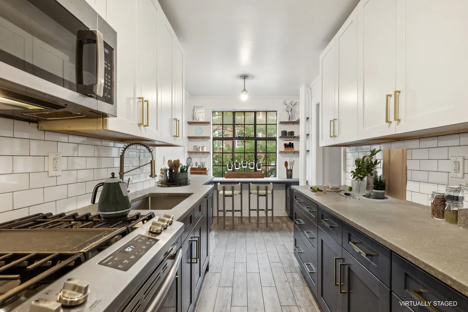 a kitchen with a stove and a sink