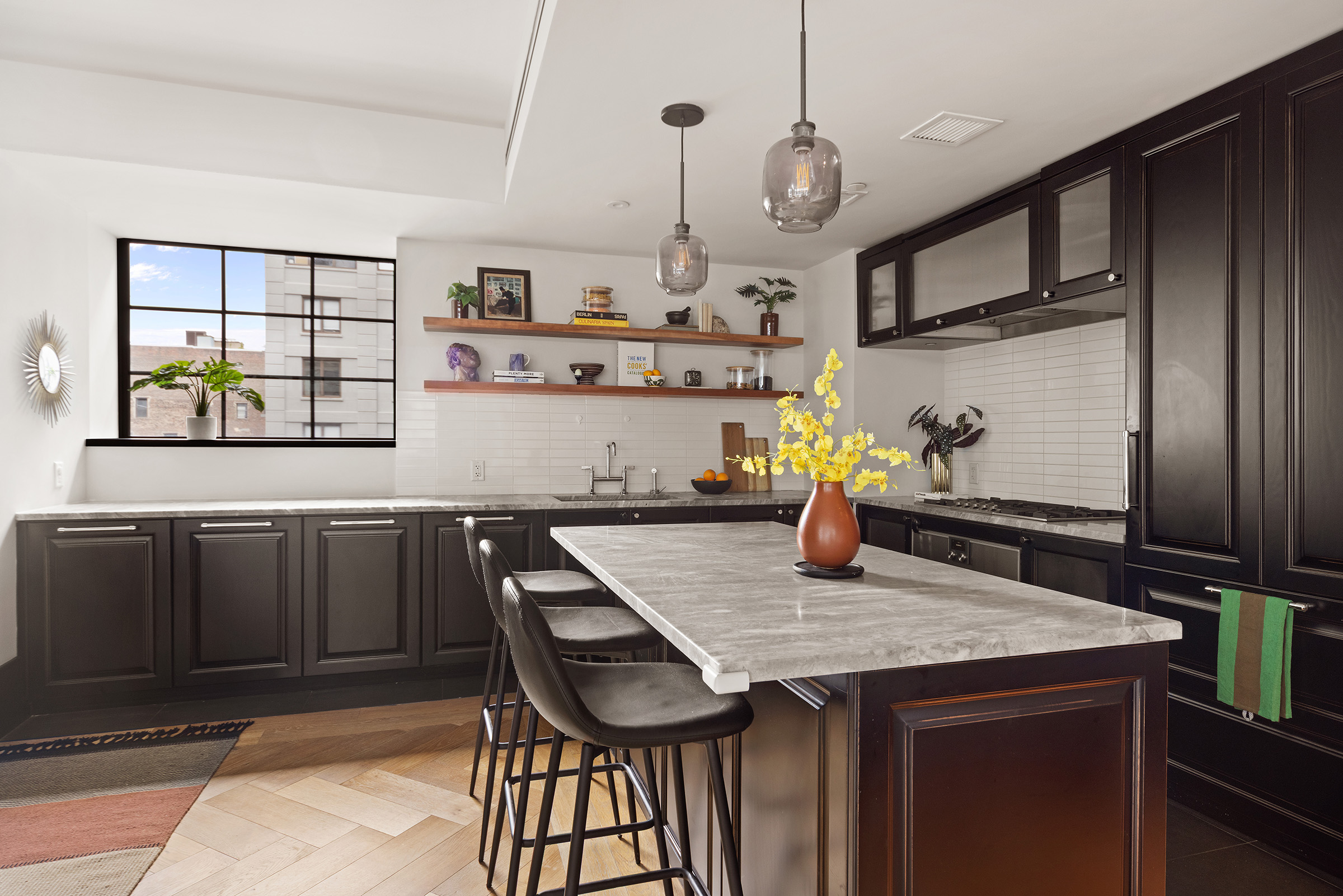 51 Jay Street, Unit 5J Brooklyn, NY 11201 - Photo 2 of 23 a kitchen with a table and chairs in it