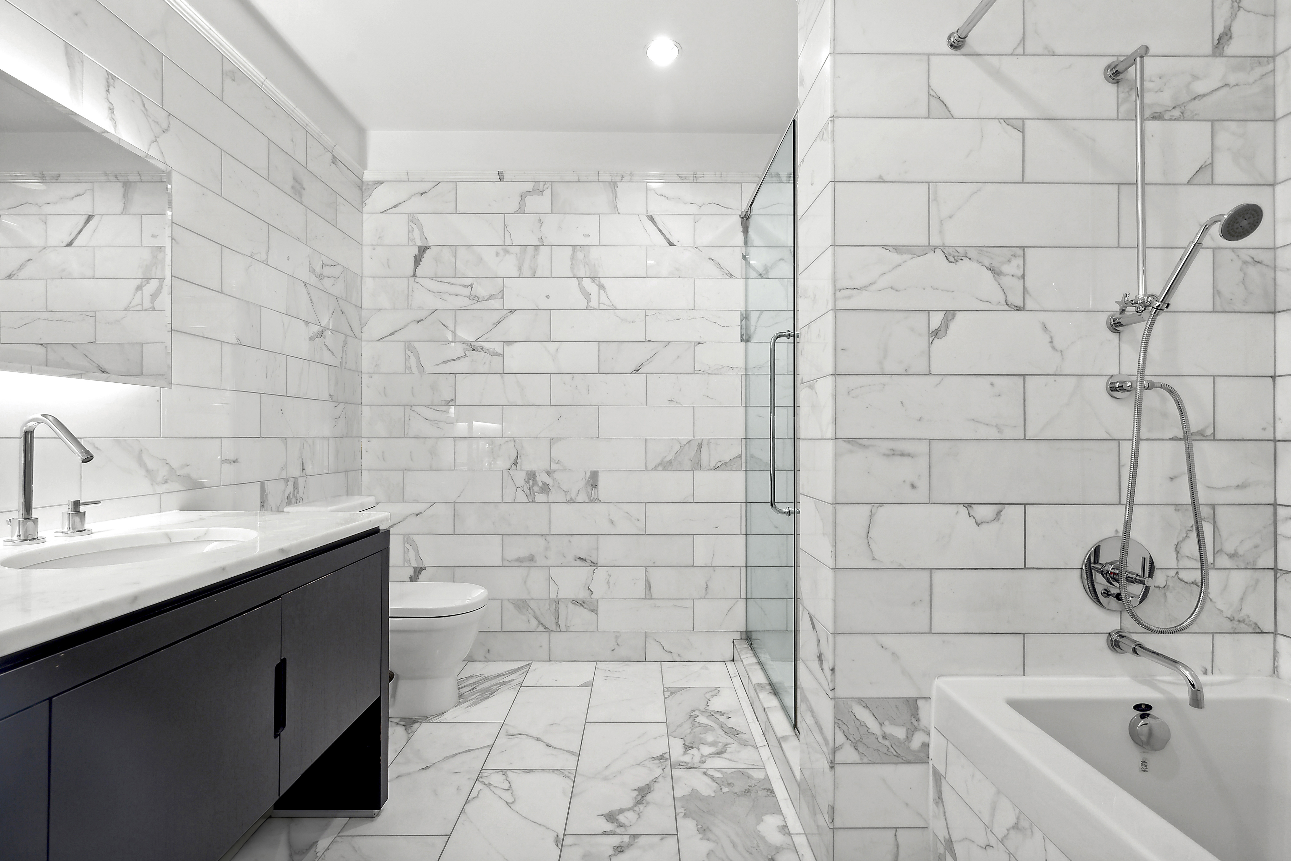 225 5th Avenue, Unit 7K Manhattan, NY 10010 - Photo 8 of 14 a bathroom with a sink and a bathtub