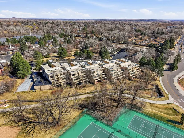 a view of yard with wooden fence