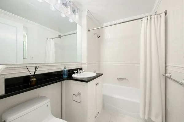 a bathroom with a sink and a bathtub
