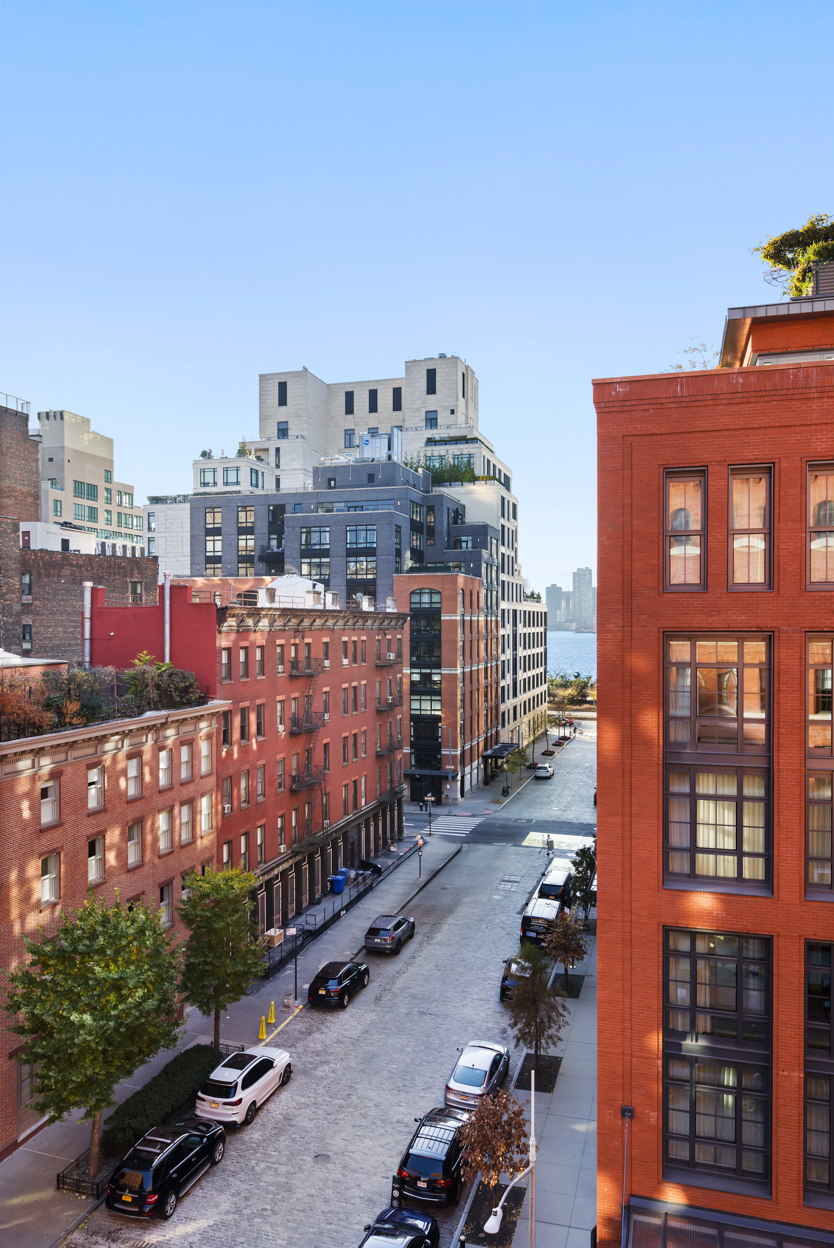 463 Greenwich Street Manhattan, NY 10013 - Photo 15 of 24 a city street filled with lots of tall buildings