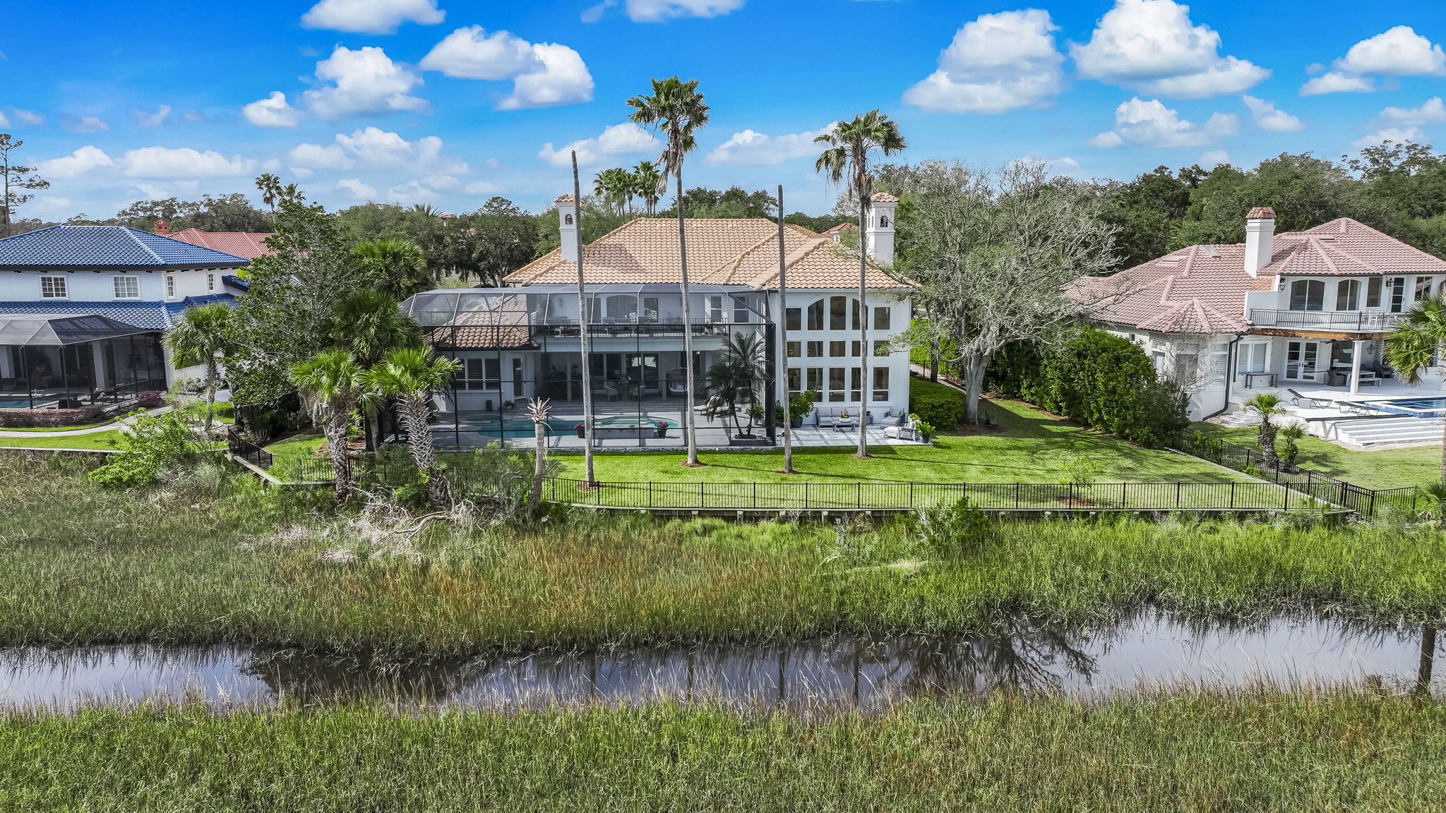 24624 Harbour View Drive Ponte Vedra Beach, FL 32082 - Photo 134 of 186 a front view of a house with a garden and lake view