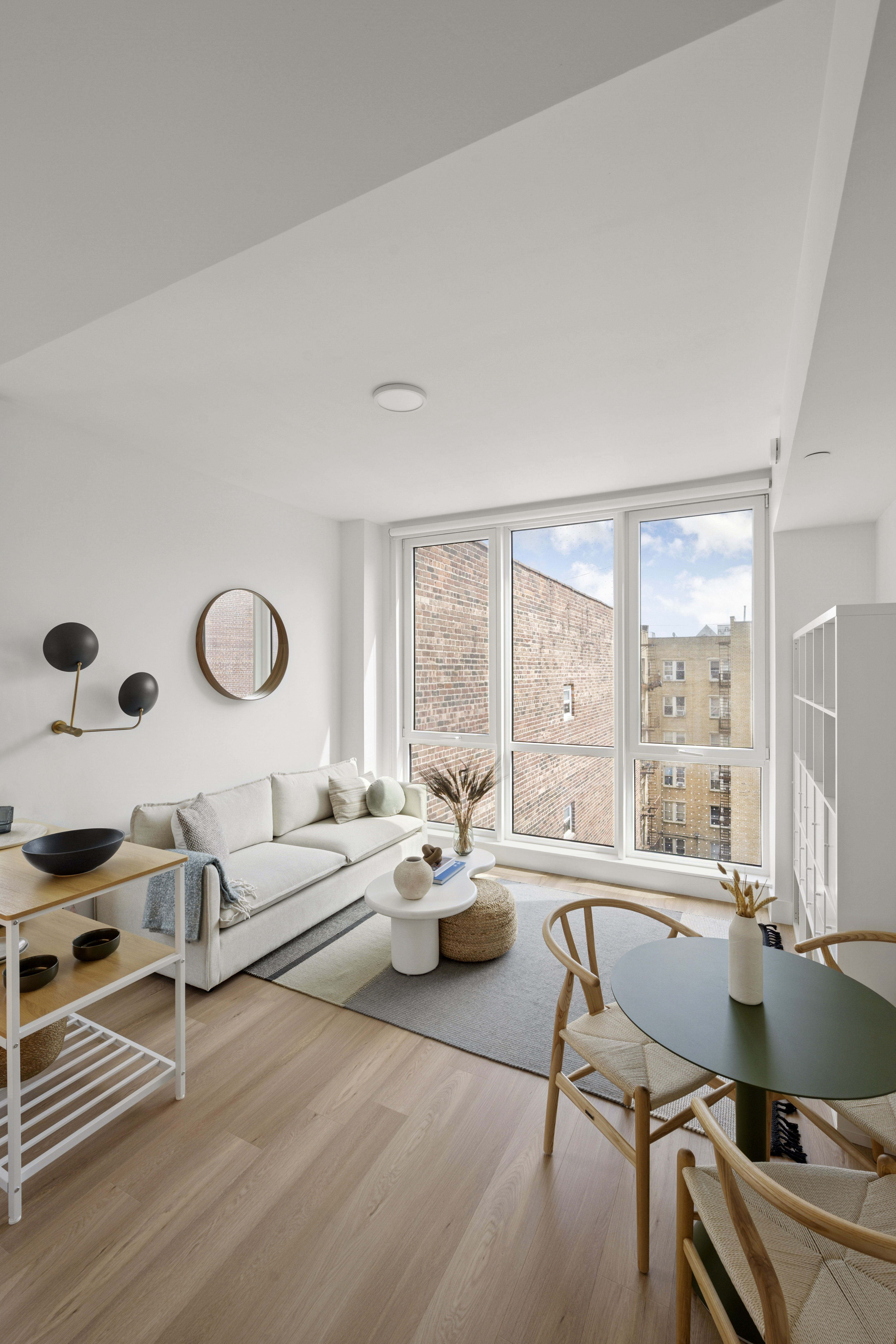 340 Lenox Road, Unit 6D Brooklyn, NY 11226 - Photo 3 of 29 a living room with furniture and a large window