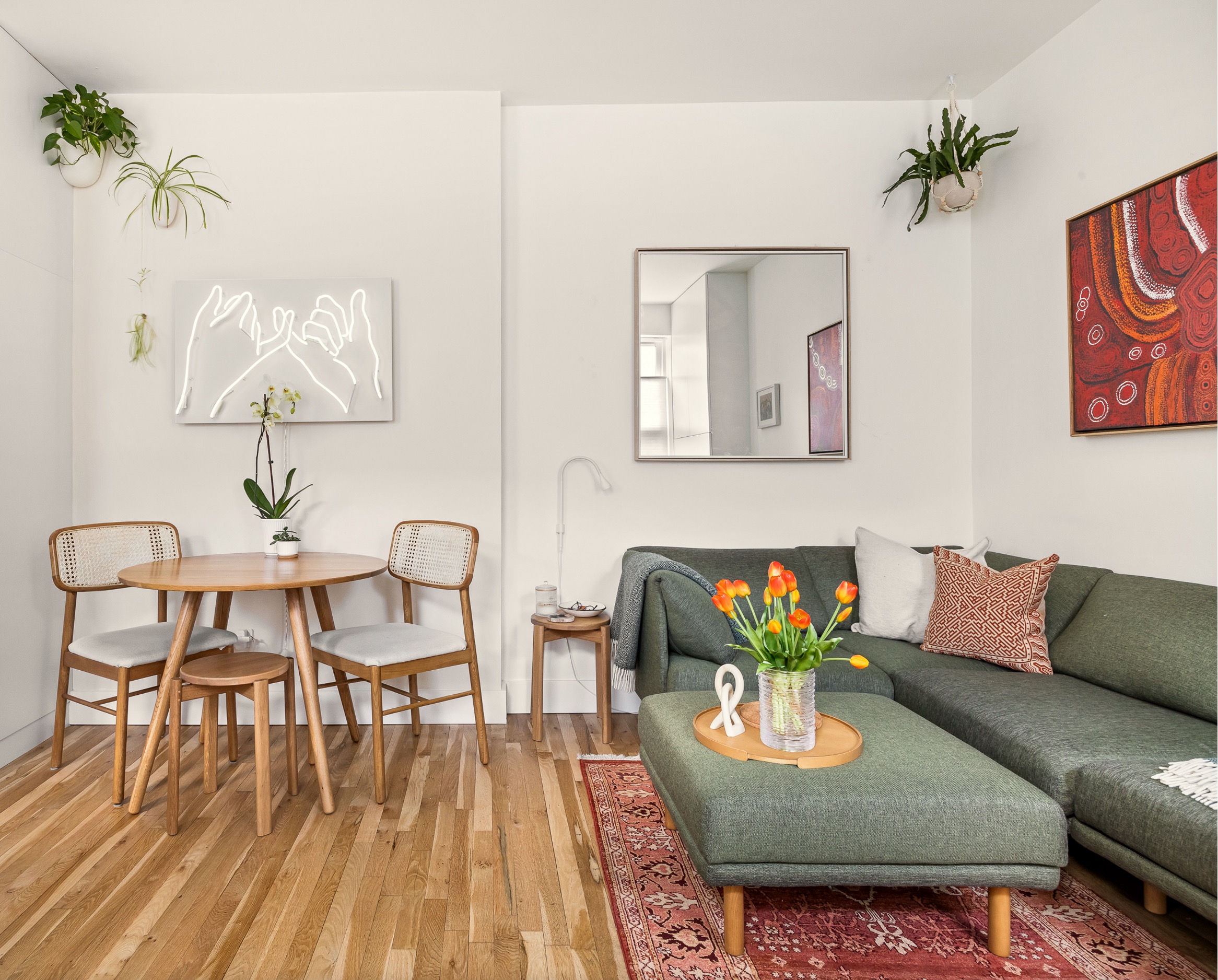 26 Butler Place, Unit 48 Brooklyn, NY 11238 - Photo 3 of 14 a living room with furniture and a wooden floor