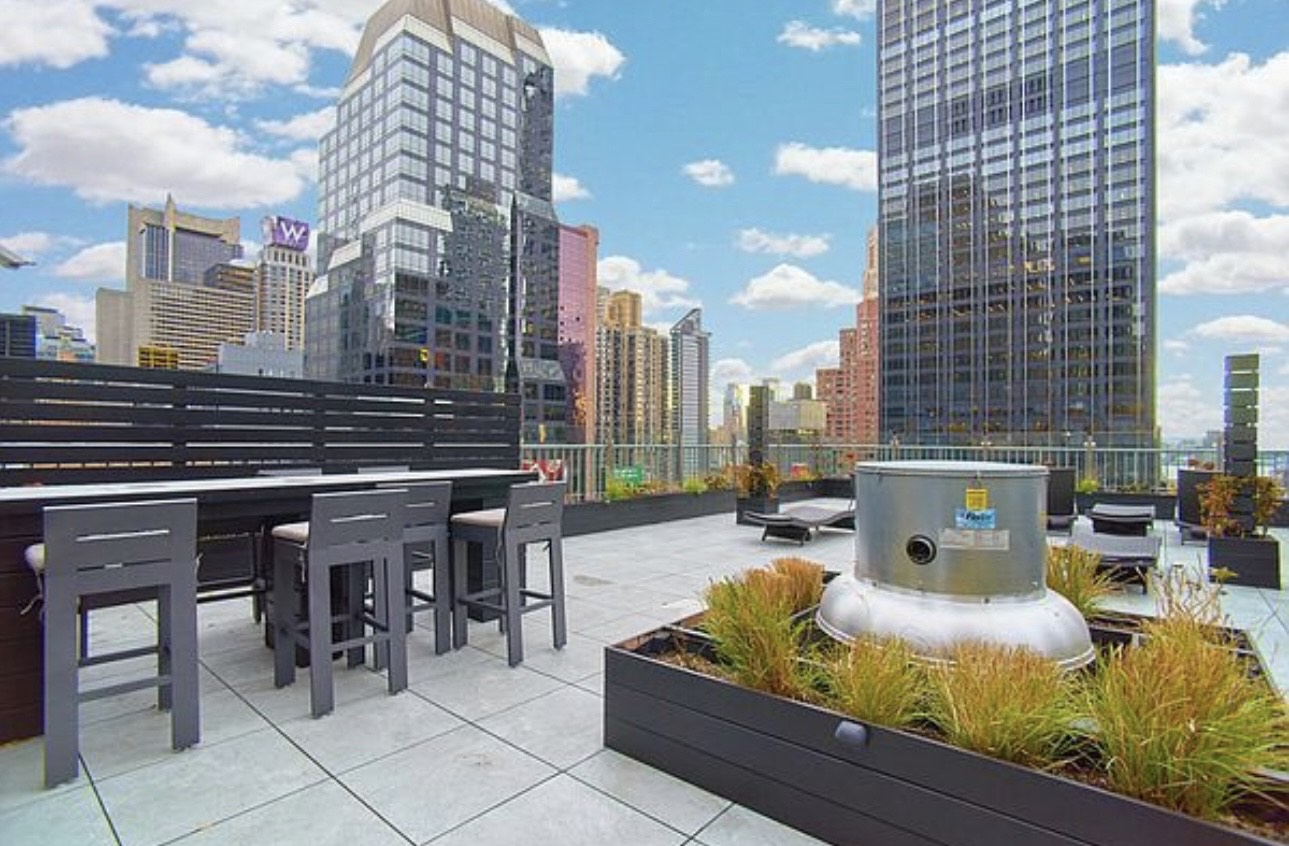 150 West 51st Street, Unit 1528 Manhattan, NY 10019 - Photo 10 of 21 a view of a terrace with chairs