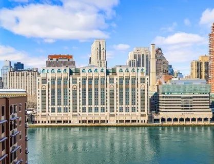a view of a city with tall buildings