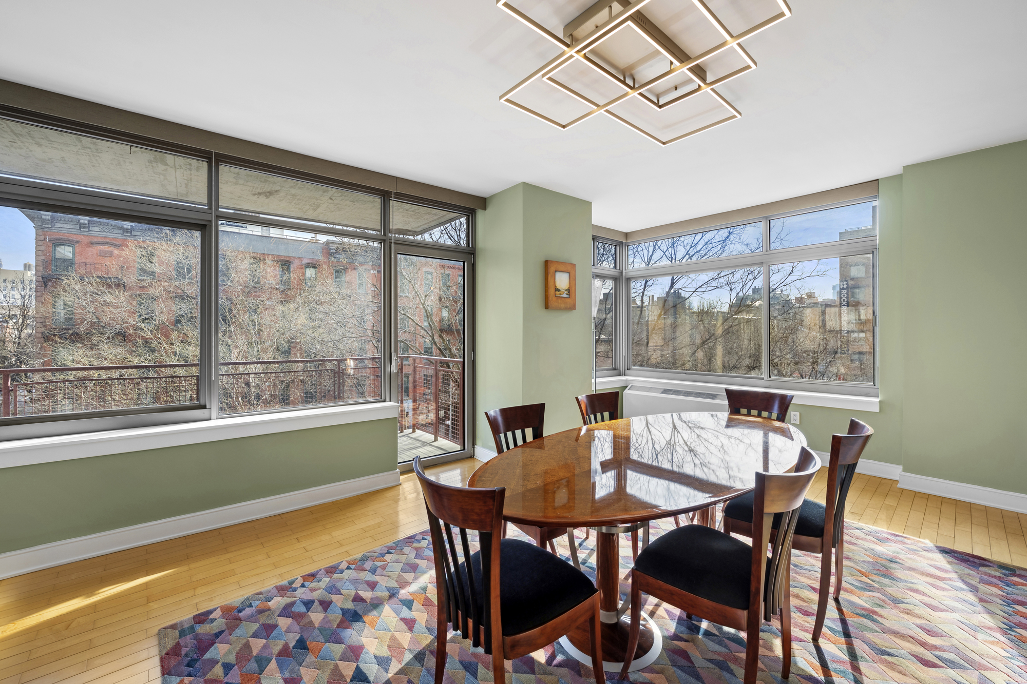 99 Jane Street, Unit 4H Manhattan, NY 10014 - Photo 4 of 22 a view of a dining room with furniture window and wooden floor
