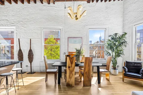 a view of a dinning tables and chair in the patio
